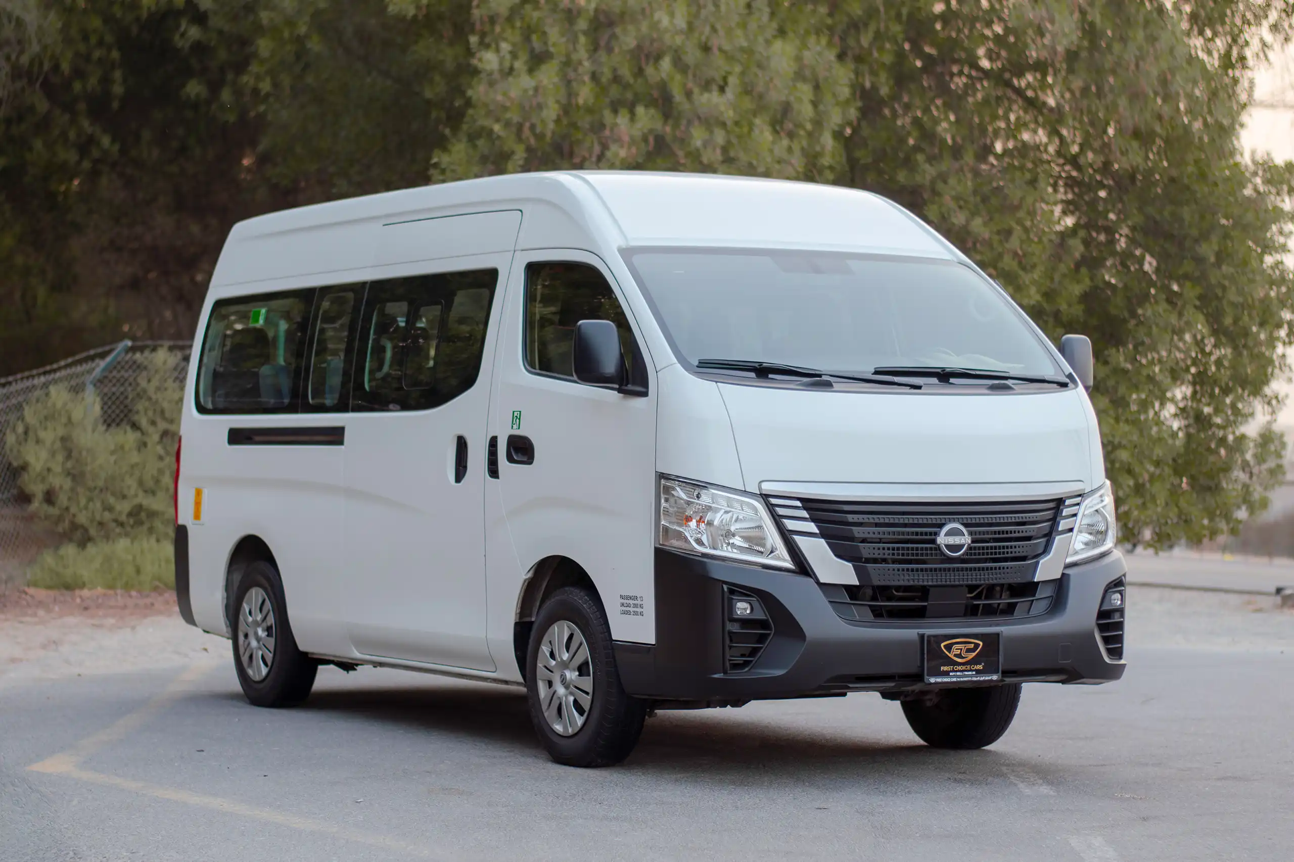 Used 2023 Nissan Urvan High Roof in White – Right Front Diagonal (45°) View for Sale at First Choice Cars Dubai Sharjah