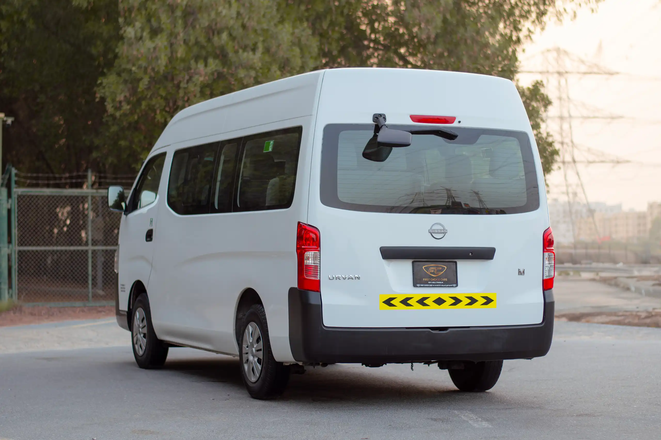 Used 2023 Nissan Urvan High Roof in White – Right Back Diagonal (45°) View for Sale at First Choice Cars Dubai Sharjah