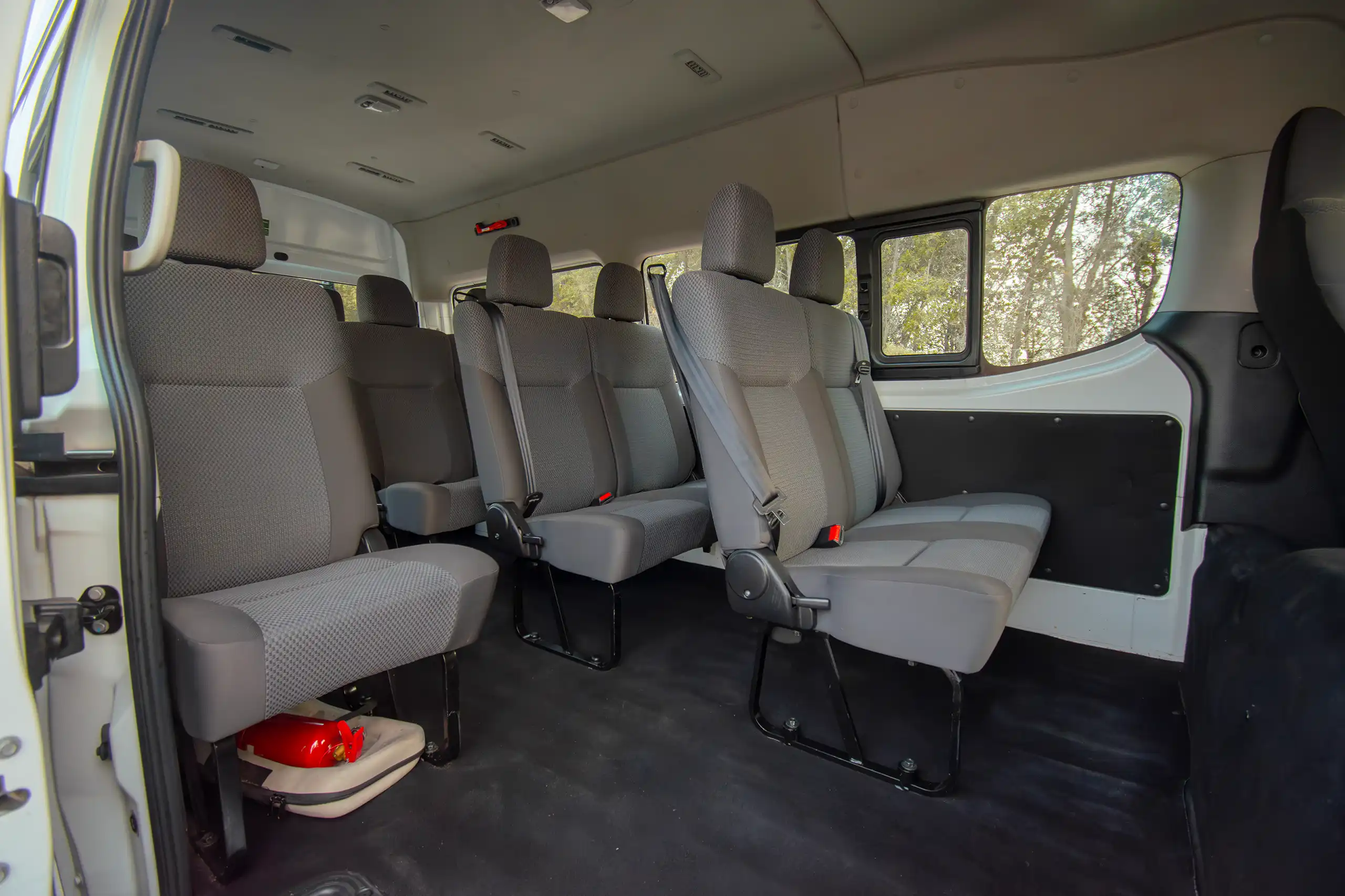 Used 2023 Nissan Urvan High Roof in White – Rear Passenger Side Cabin View for Sale at First Choice Cars Dubai Sharjah
