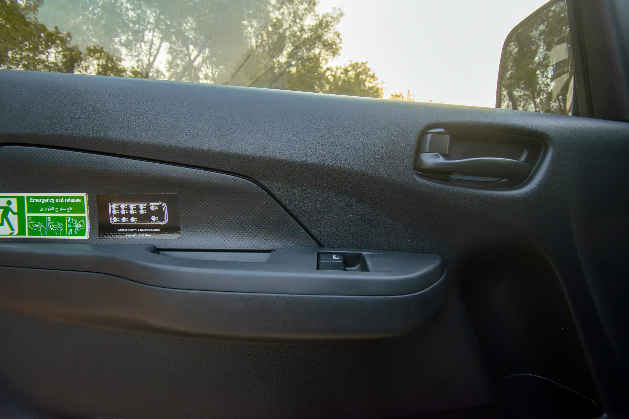 Used 2023 Nissan Urvan Microbus S/R White – Driver Door Panel Full View at First Choice Cars Sharjah