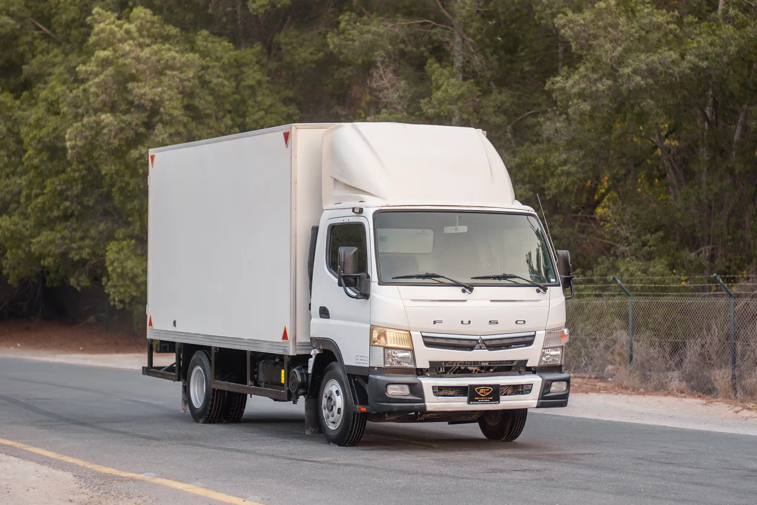 Used 2020 Mitsubishi Canter Cargo Box in White – Right Front Diagonal (45°) View for Sale at First Choice Cars Dubai Sharjah
