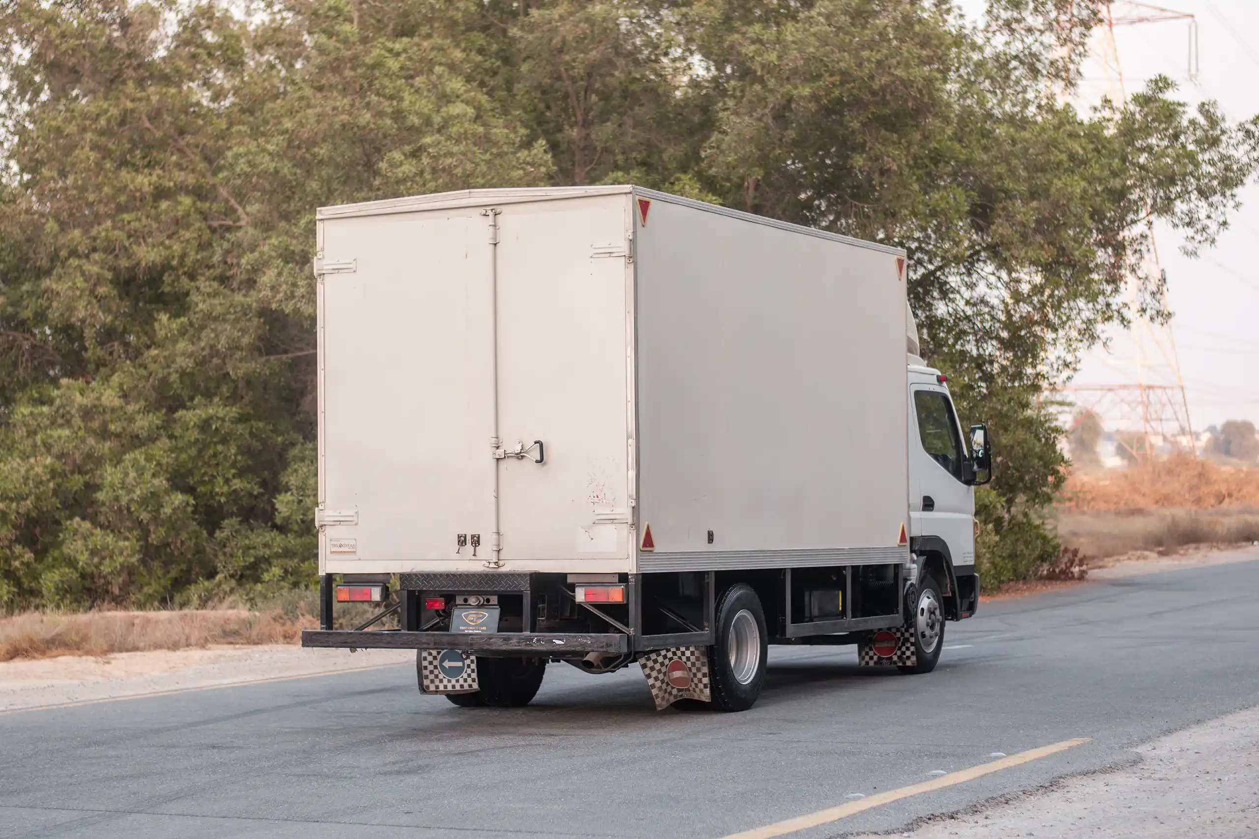 Used 2020 Mitsubishi Canter Cargo Box in White – Right Back Diagonal (45°) View for Sale at First Choice Cars Dubai Sharjah