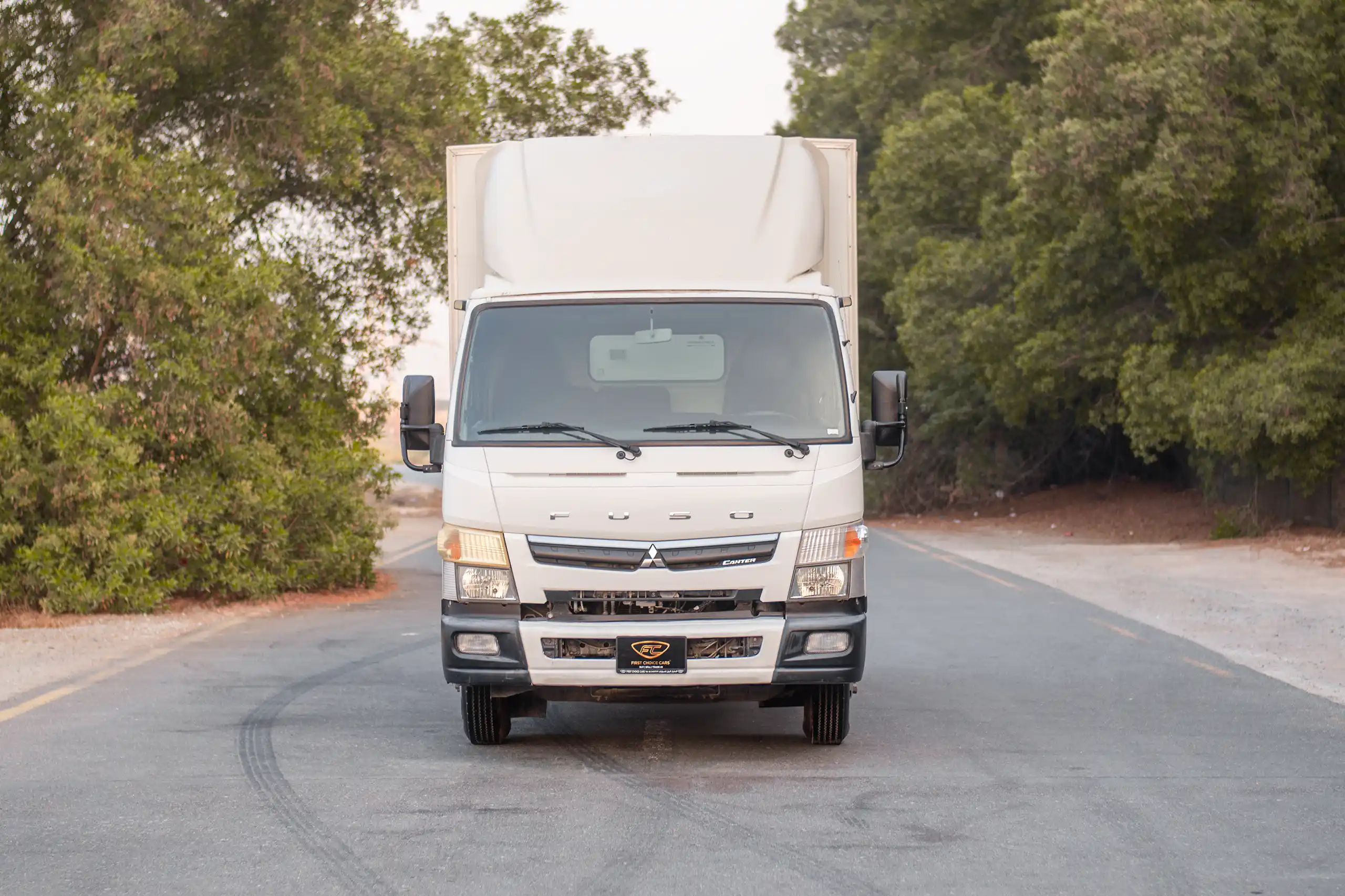 Used 2020 Mitsubishi Canter Cargo Box in White – Front View for Sale at First Choice Cars Dubai Sharjah