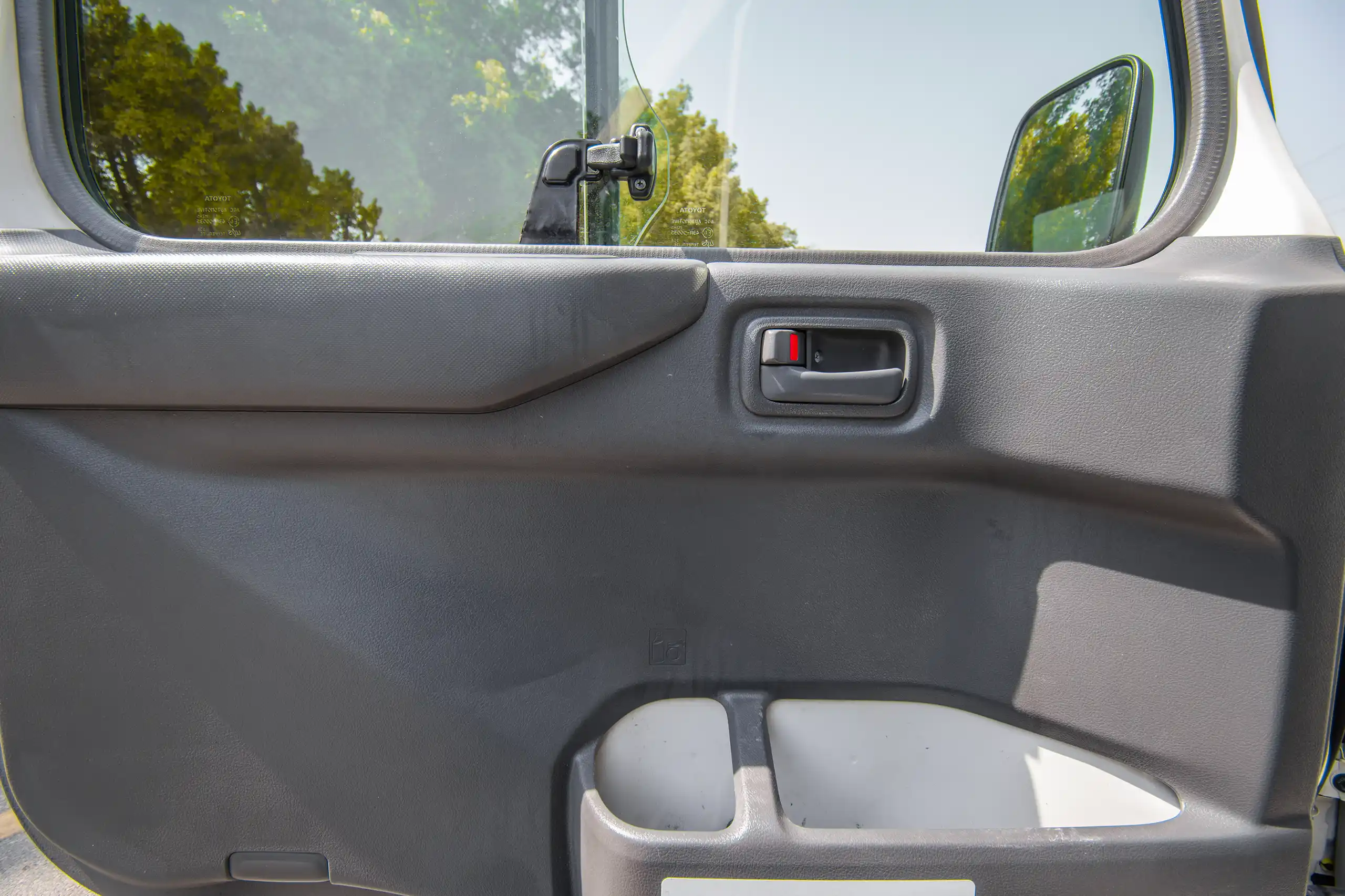 Used 2020 Toyota Coaster Bus White – Driver Door Panel Full View at First Choice Cars Sharjah