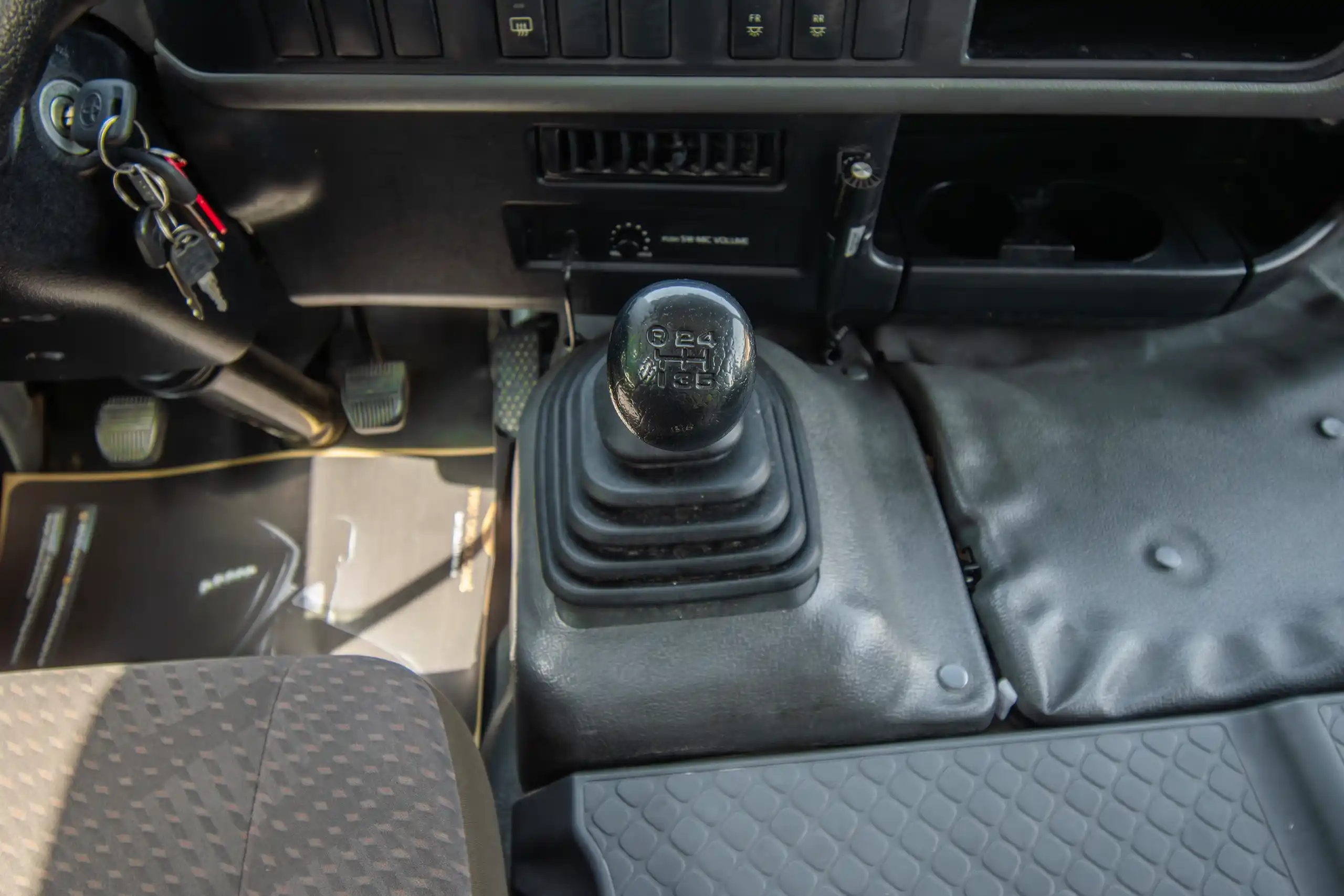 Used 2020 Toyota Coaster High Roof in White – Center Console & Gear Shifter