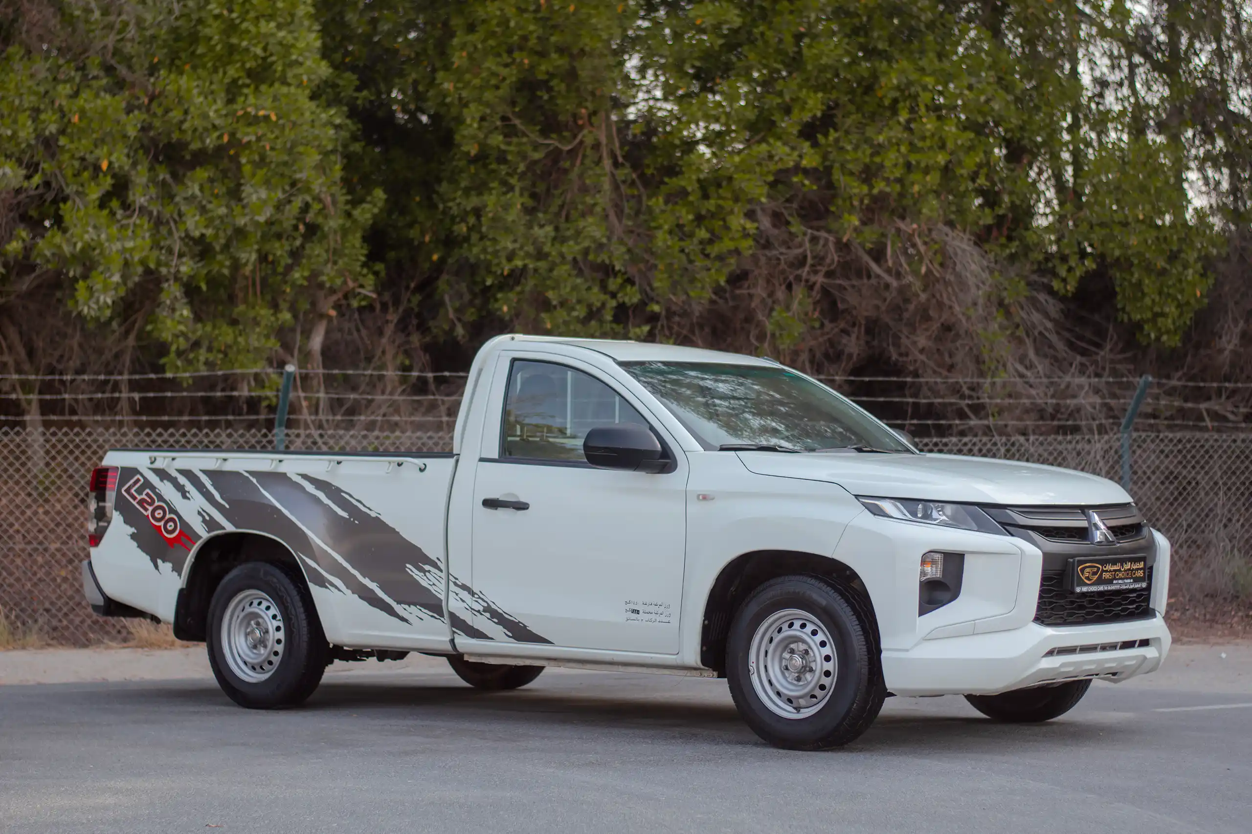 Used 2021 Mitsubishi L200 GL Single Cabin in White – Right Front Diagonal (45°) View for Sale at First Choice Cars Dubai Sharjah
