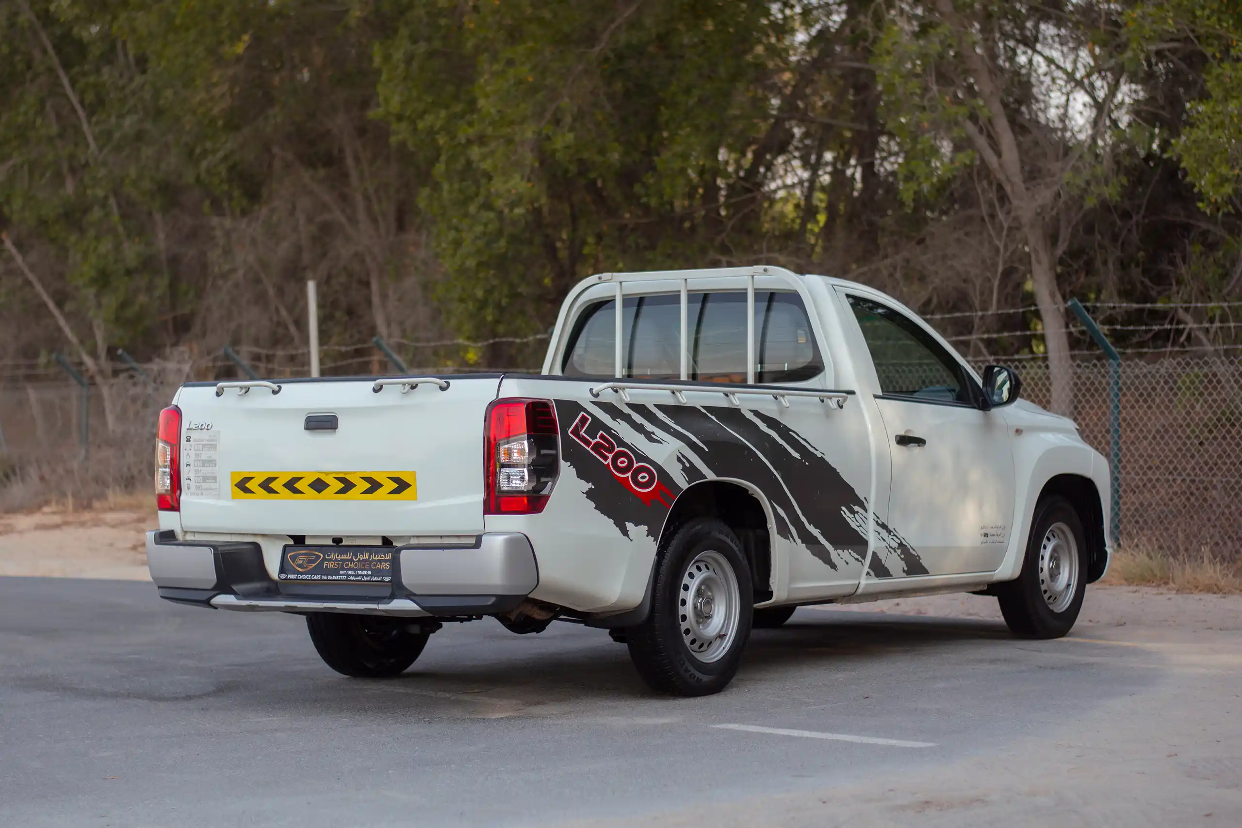 Used 2021 Mitsubishi L200 GL Single Cabin in White – Right Back Diagonal (45°) View for Sale at First Choice Cars Dubai Sharjah