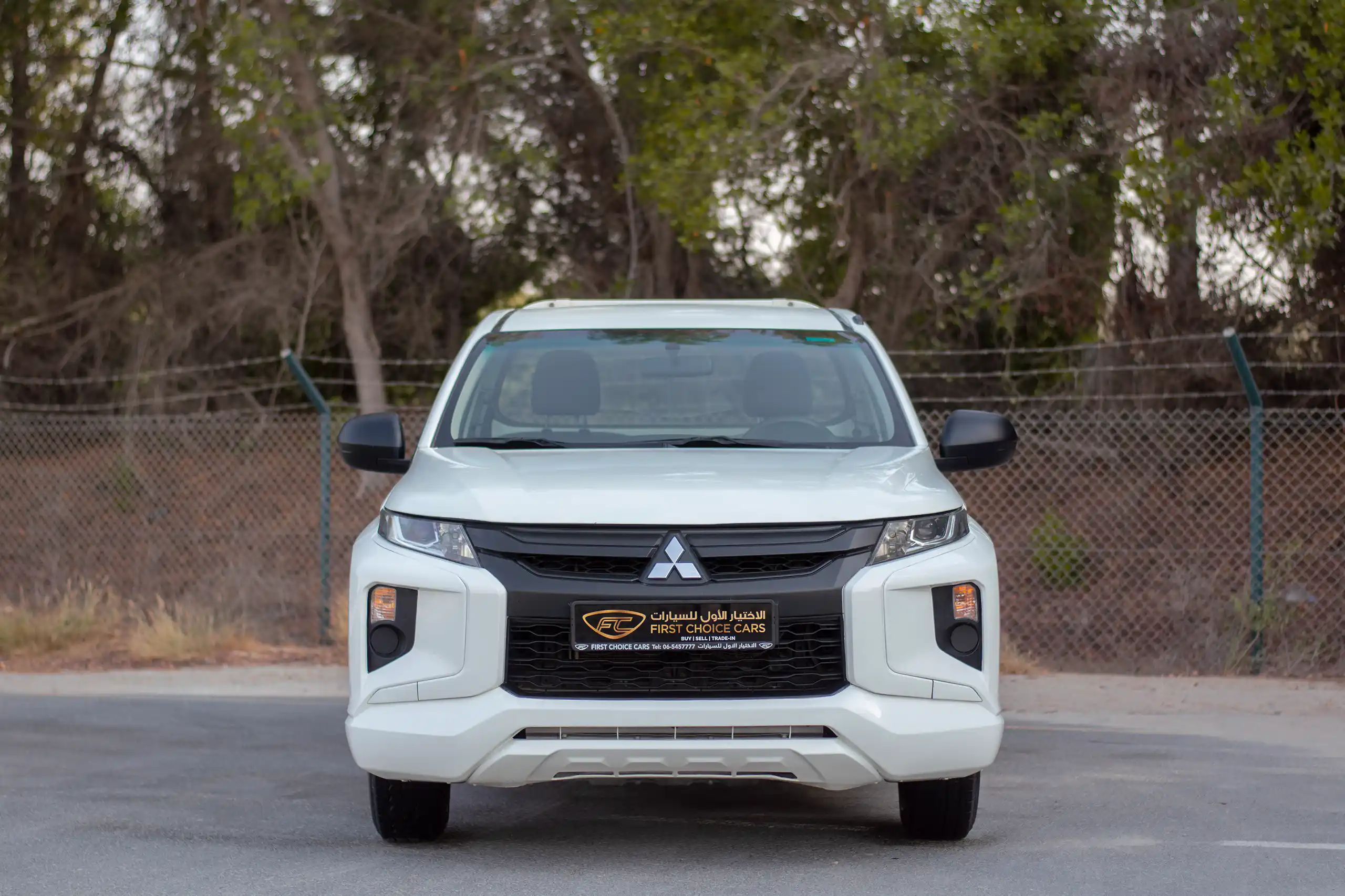 Used 2021 Mitsubishi L200 GL Single Cabin in White – Front View for Sale at First Choice Cars Dubai Sharjah