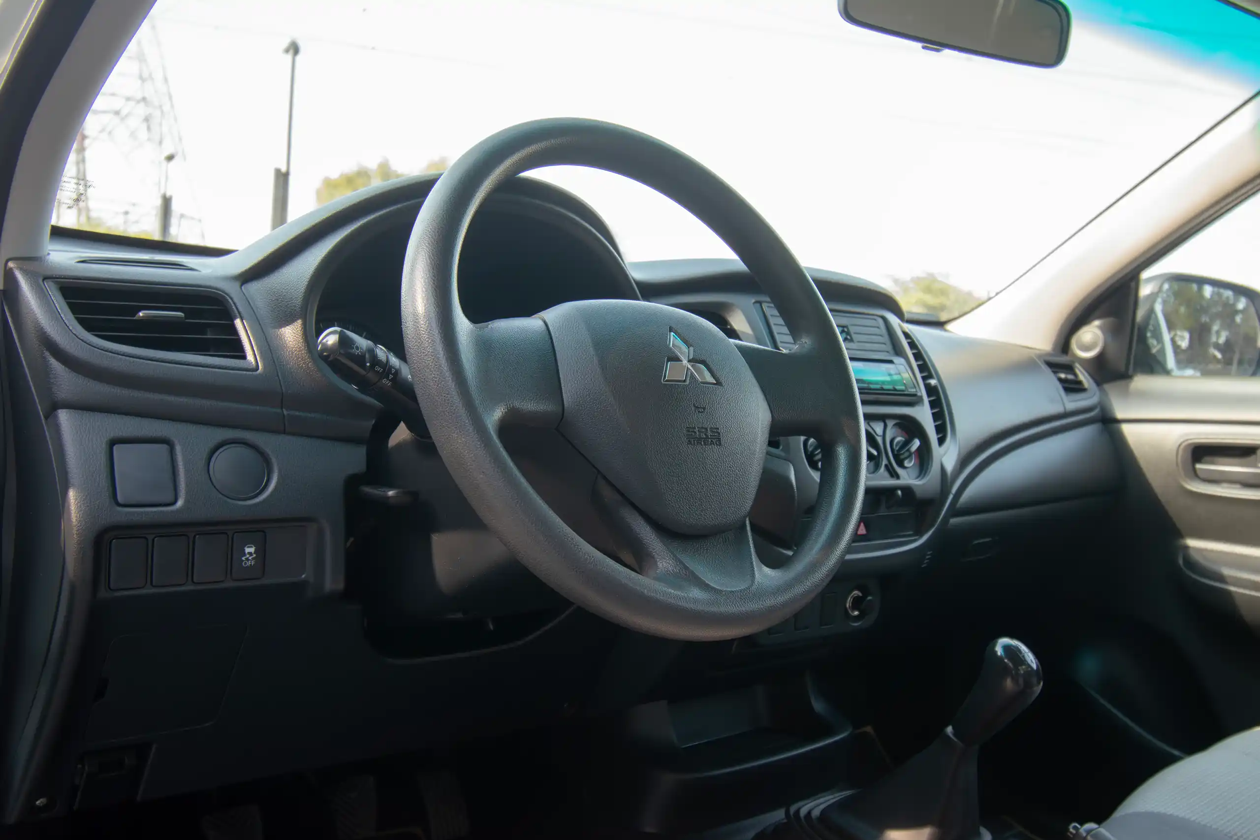 Used 2021 Mitsubishi L200 GL Single Cabin in White – Steering Wheel & Instrument Cluster for Sale at First Choice Cars Dubai Sharjah