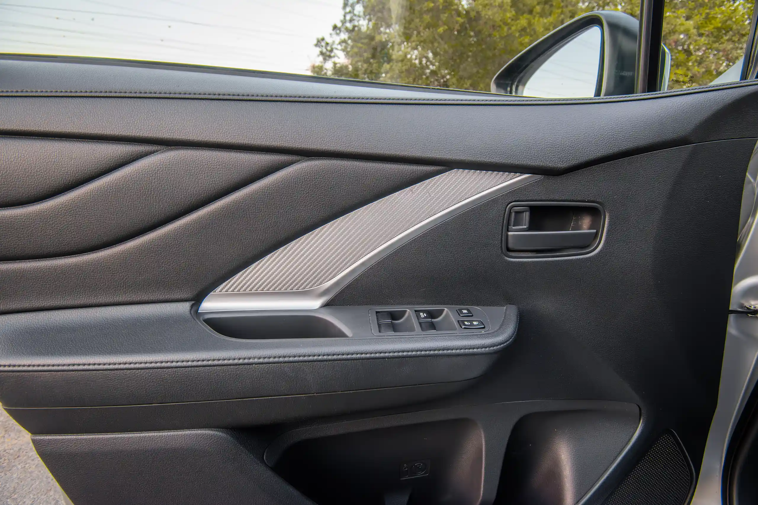 Used 2022 Mitsubishi Xpander GLS Silver – Driver Door Panel Full View at First Choice Cars Sharjah