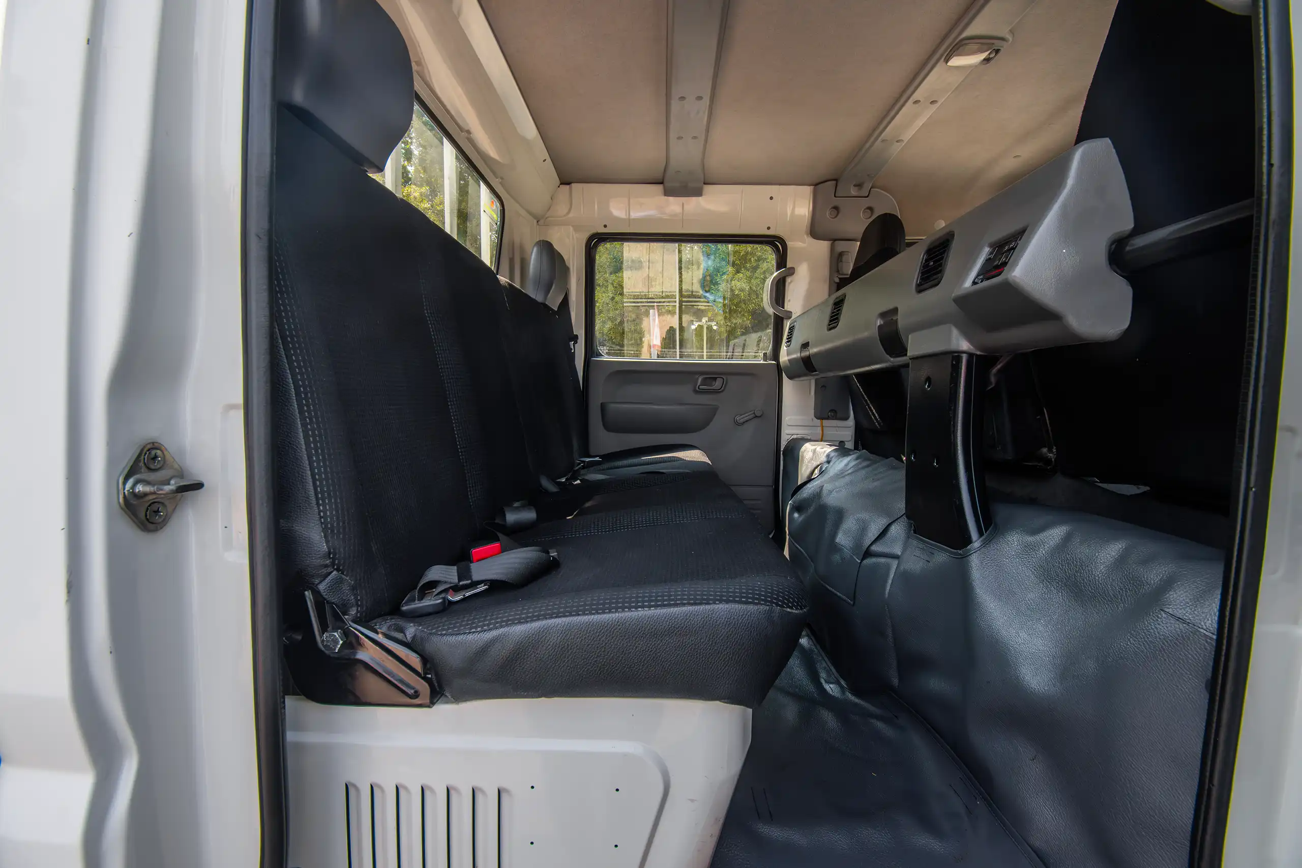 Used 2023 Mitsubishi Canter Double Cabin Cargo Body White – Rear Passenger Side Cabin View at First Choice Cars Sharjah