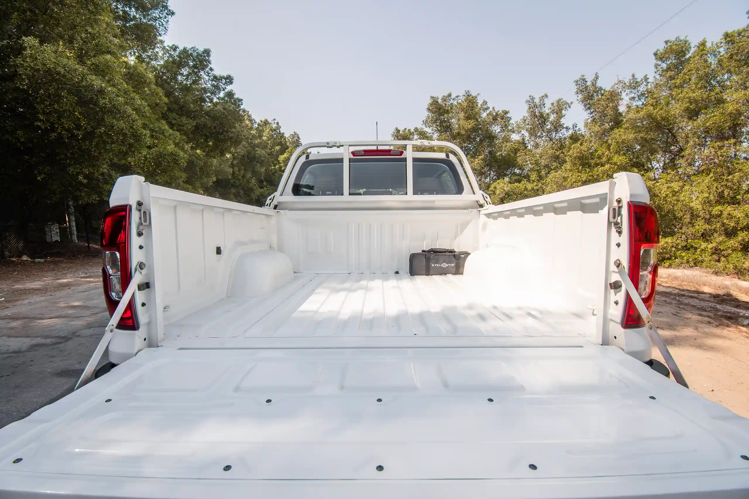 Used 2023 Peugeot Landtrek Double Cabin White – Cargo Bed Interior View at First Choice Cars Sharjah