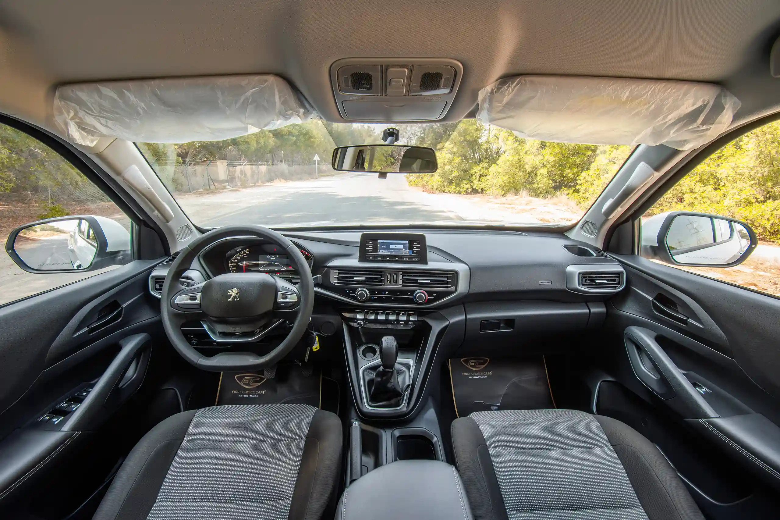 Used 2023 Peugeot Landtrek Double Cabin White – Front Cabin / Dashboard Full View at First Choice Cars Sharjah
