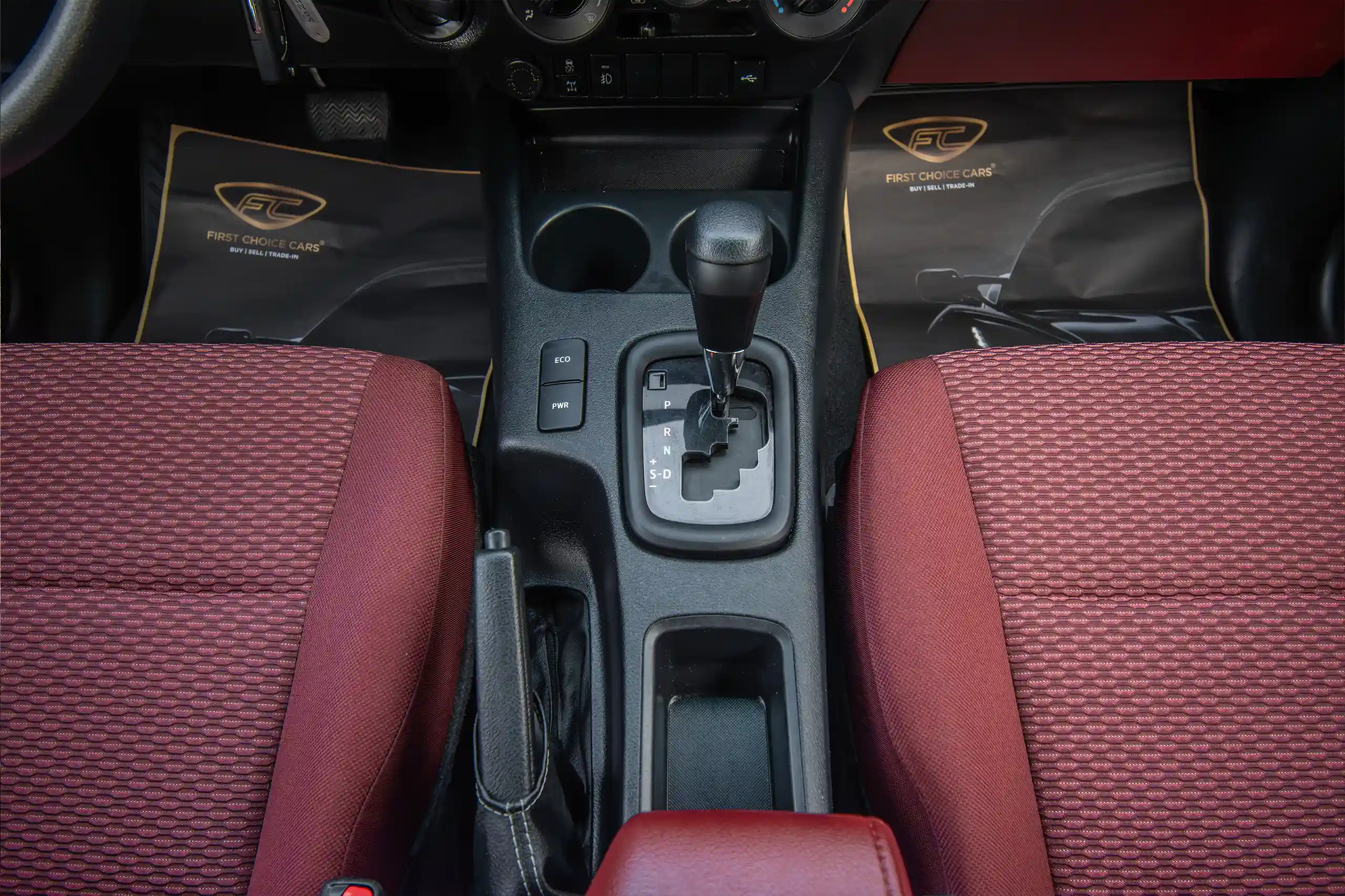 Used 2024 Toyota Hilux DLX Double Cabin in White – Center Console & Gear Shifter for Sale at First Choice Cars Dubai Sharjah