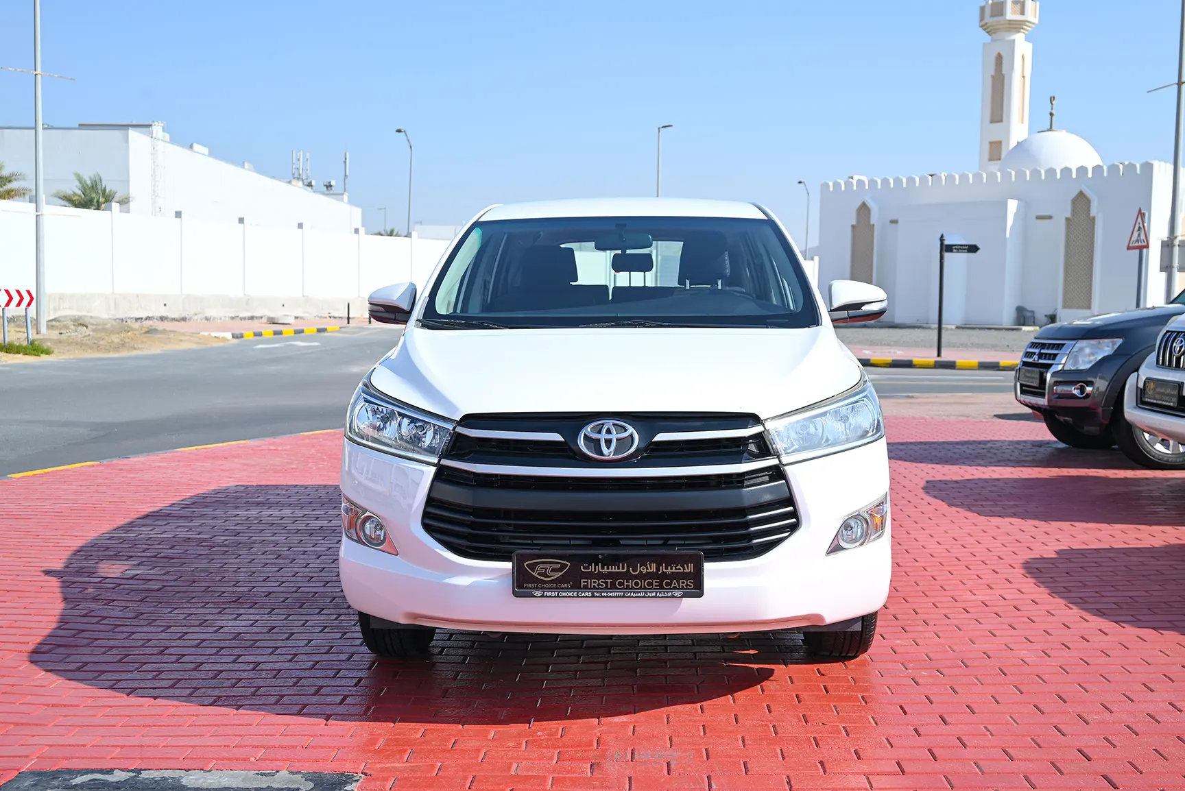 Used 2019 Toyota Innova SE White – Front Seats View at First Choice Cars Sharjah