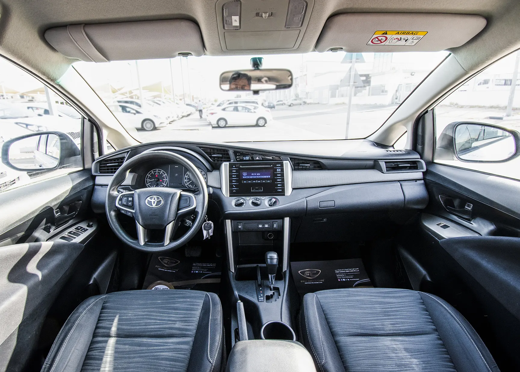 Used 2019 Toyota Innova SE White – Front Cabin / Dashboard Full View at First Choice Cars Sharjah