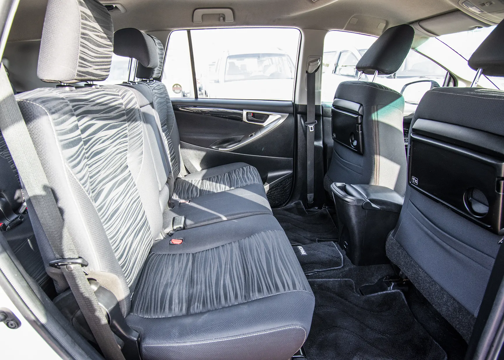 Used 2019 Toyota Innova SE White – Rear Passenger Side Cabin View at First Choice Cars Sharjah