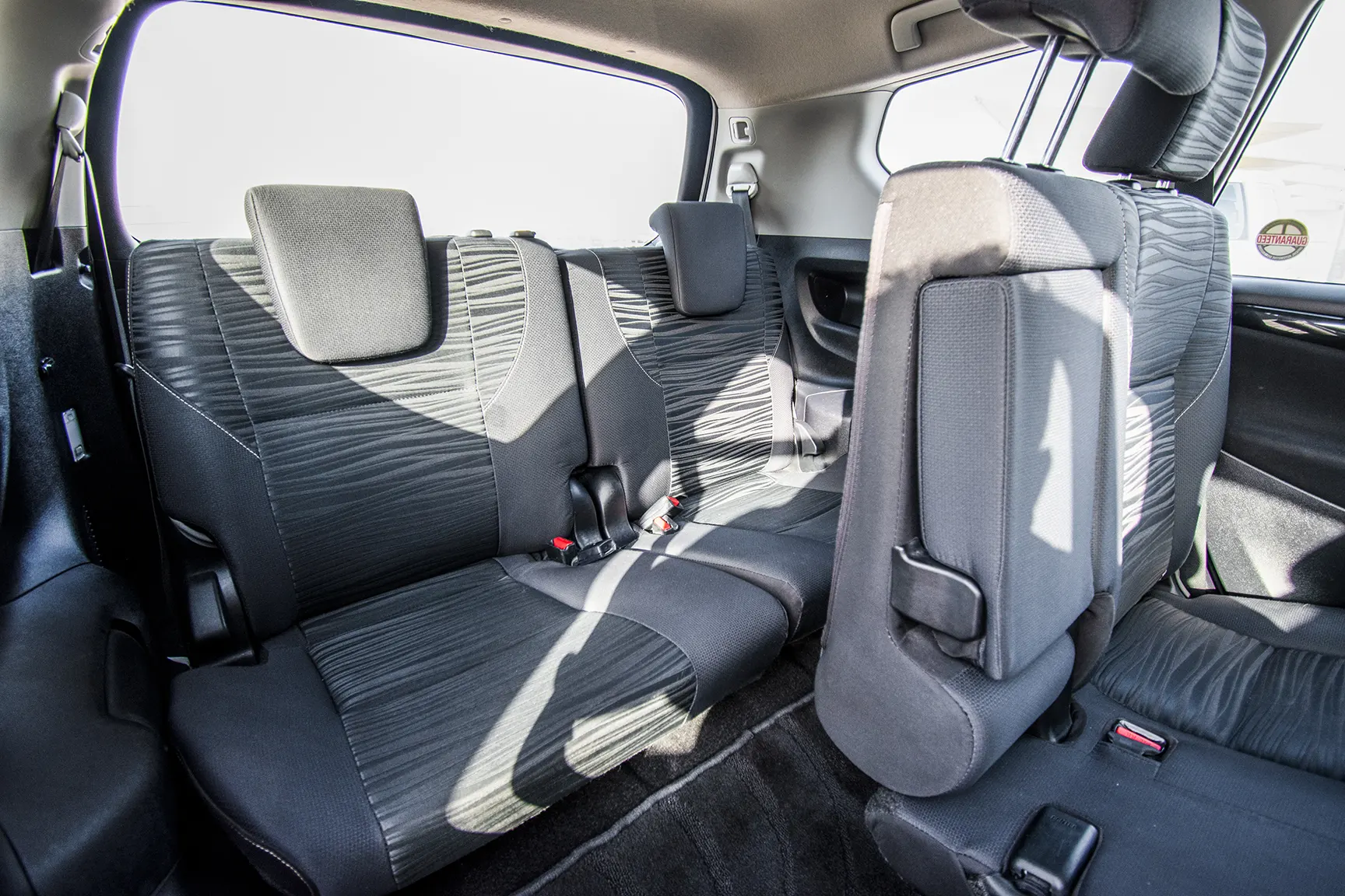 Used 2019 Toyota Innova SE White – Third Row Right Seat View at First Choice Cars Sharjah