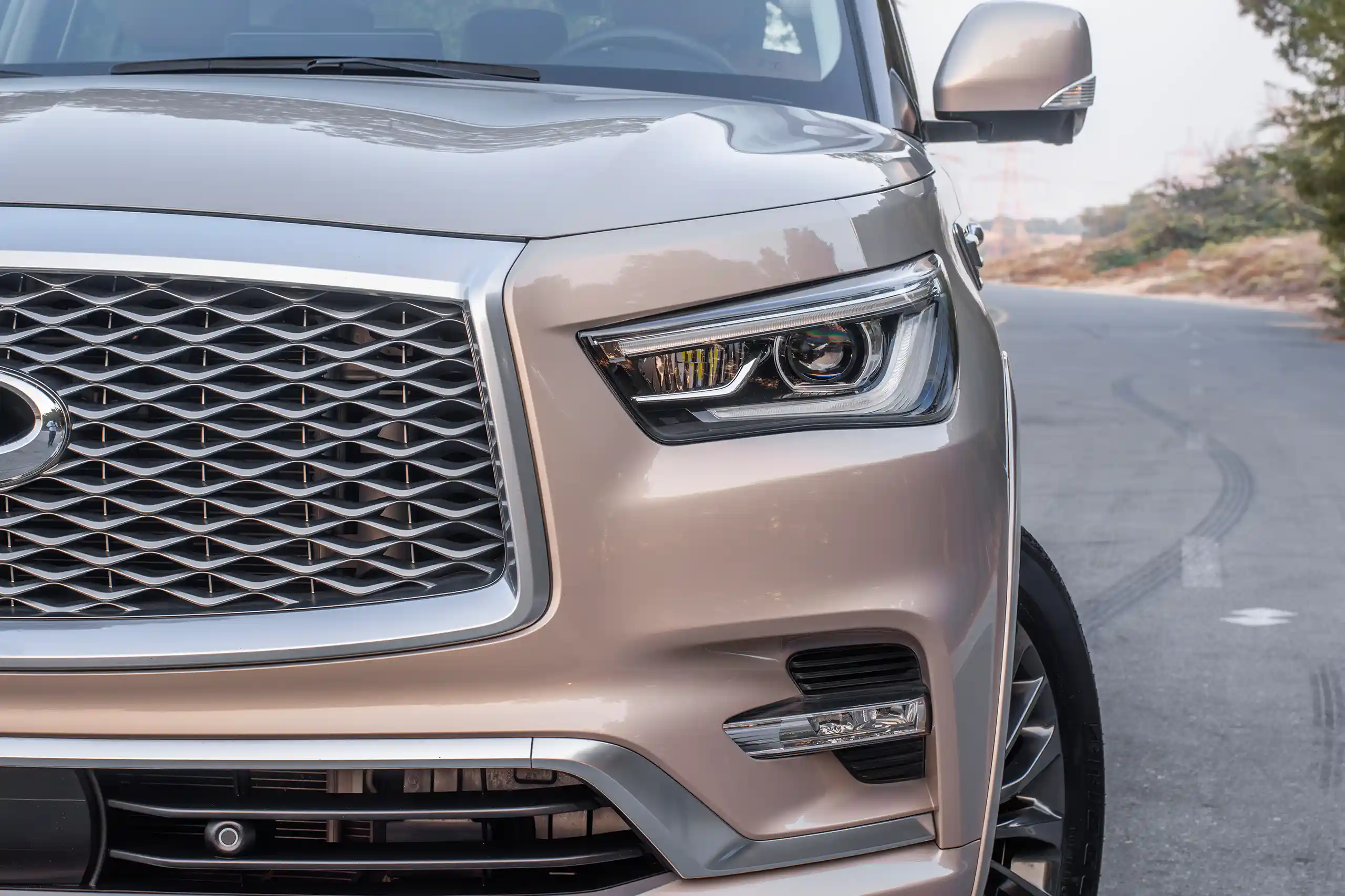 Used 2023 Infiniti QX80 Luxury Grey – Headlight Close-up at First Choice Cars Sharjah