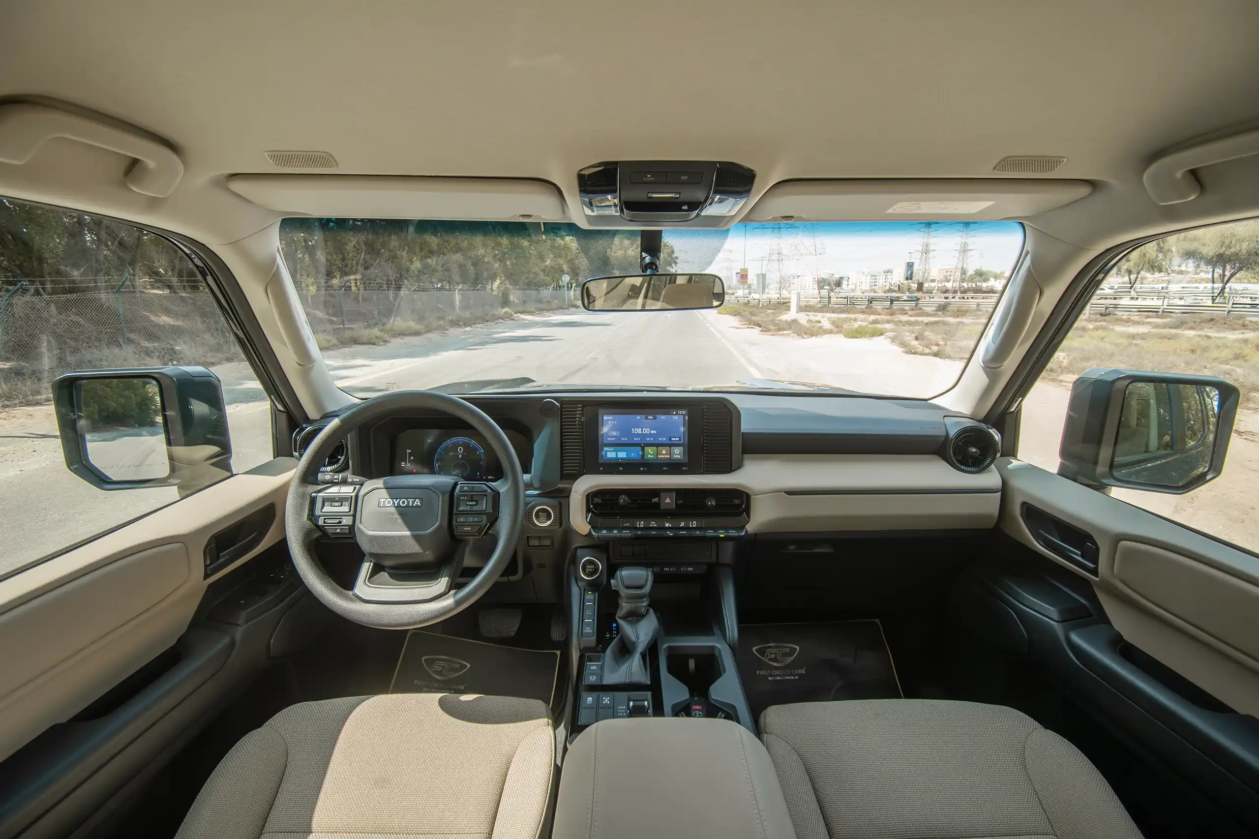 Used 2024 Toyota Prado TXR Grey – Front Cabin / Dashboard Full View at First Choice Cars Sharjah