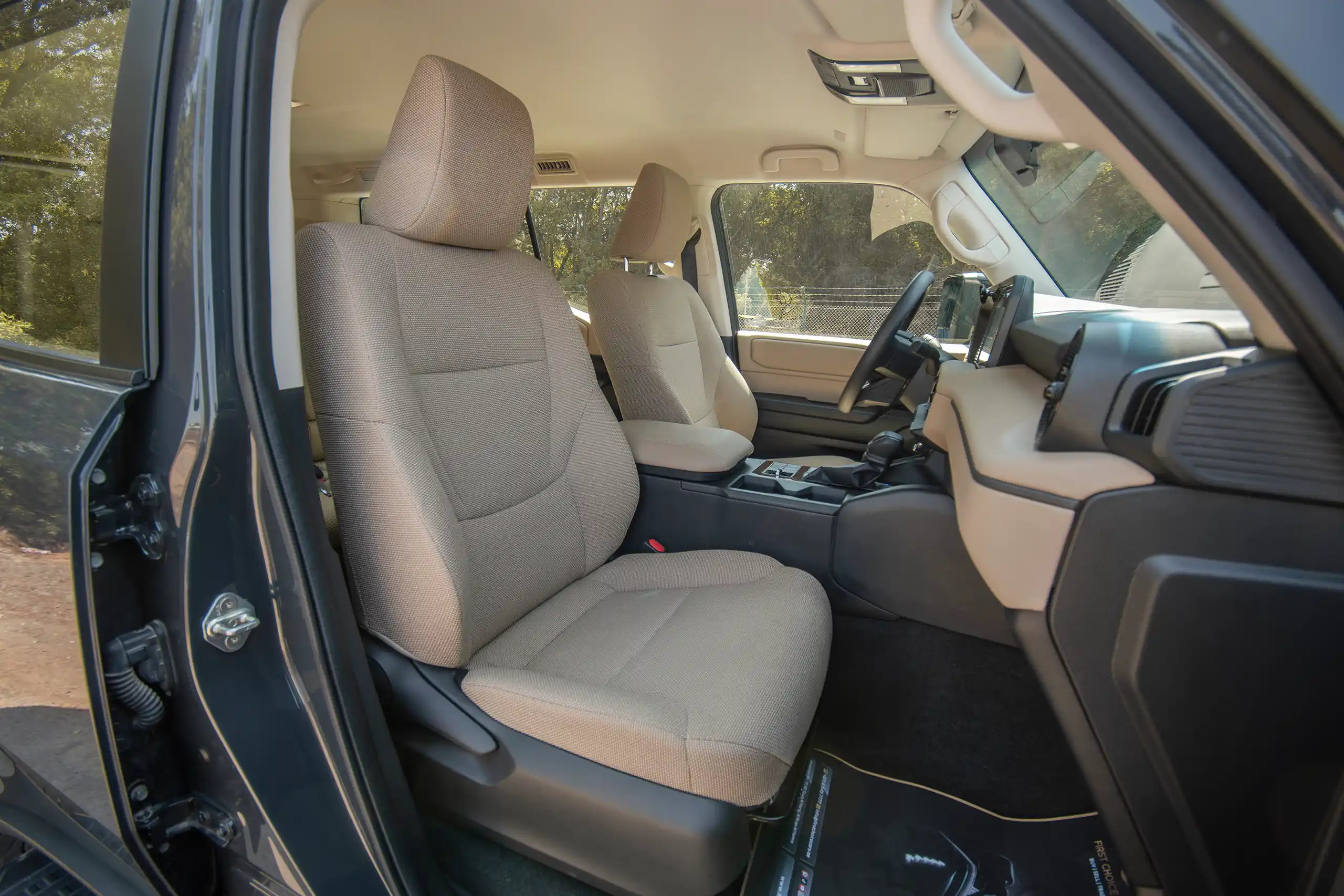 Used 2024 Toyota Prado TXR Grey – Front Passenger Side Cabin View at First Choice Cars Sharjah