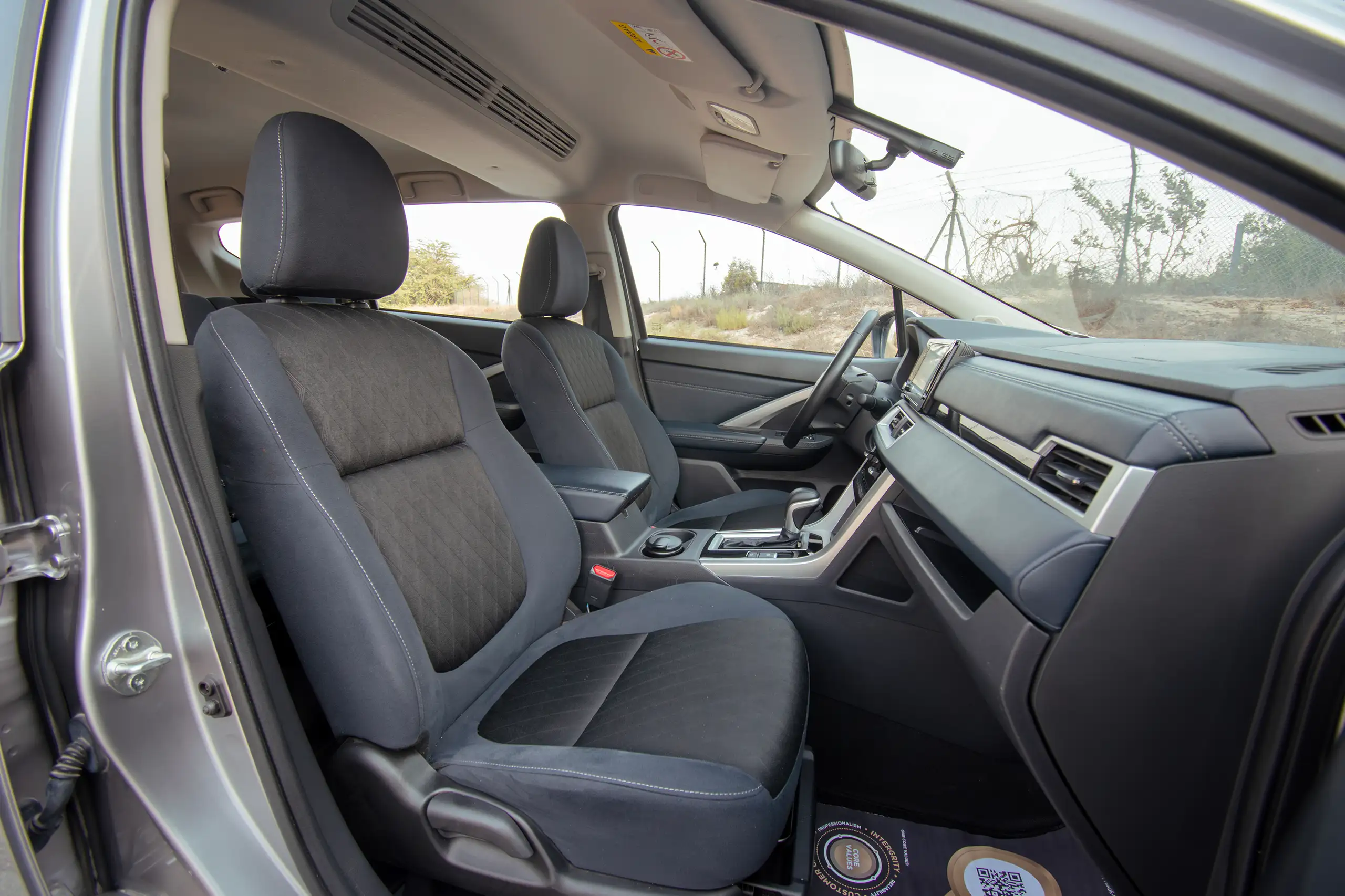 Used 2024 Mitsubishi Xpander Cross Premium Silver – Front Passenger Side Cabin View at First Choice Cars Sharjah