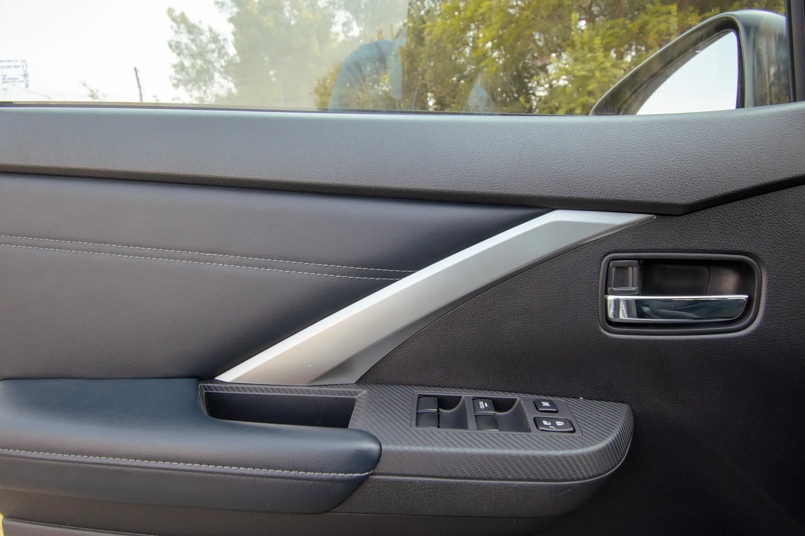 Used 2024 Mitsubishi Xpander Cross Premium Silver – Driver Door Panel Full View at First Choice Cars Sharjah