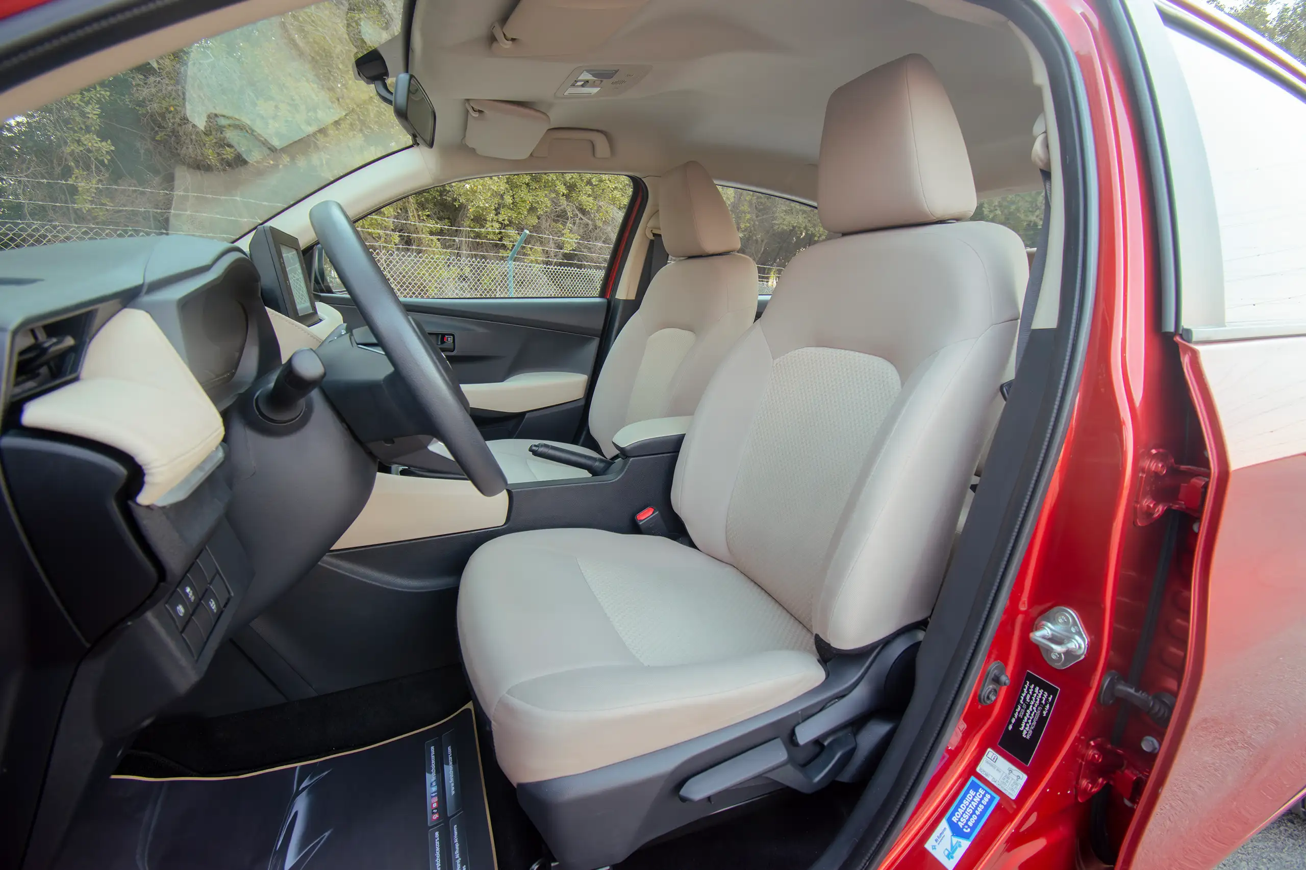 Used 2023 Toyota Yaris E Red – Front Driver Side Cabin View at First Choice Cars Sharjah