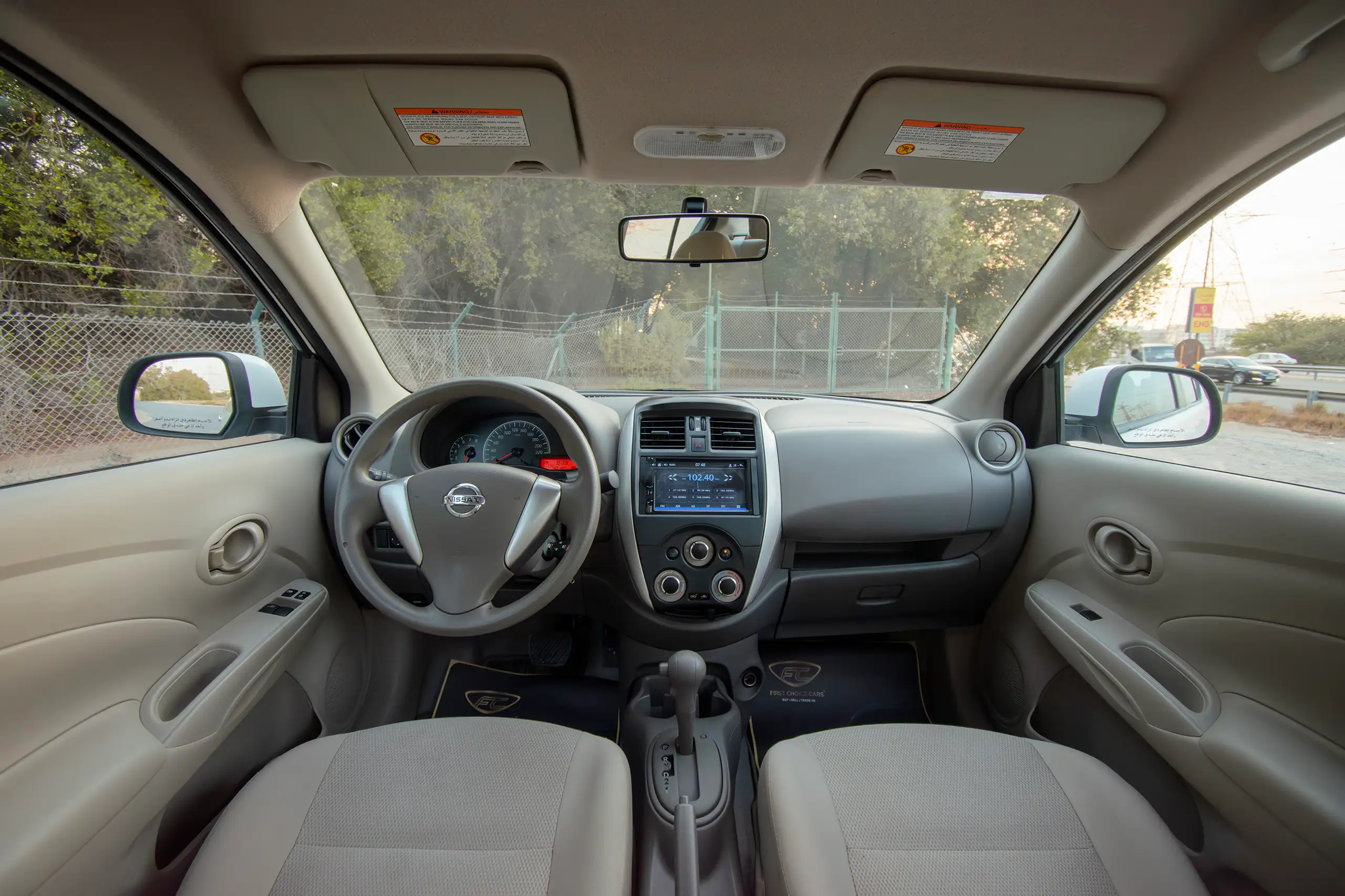 Used 2023 Nissan Sunny Sv White – Front Cabin / Dashboard Full View at First Choice Cars Sharjah