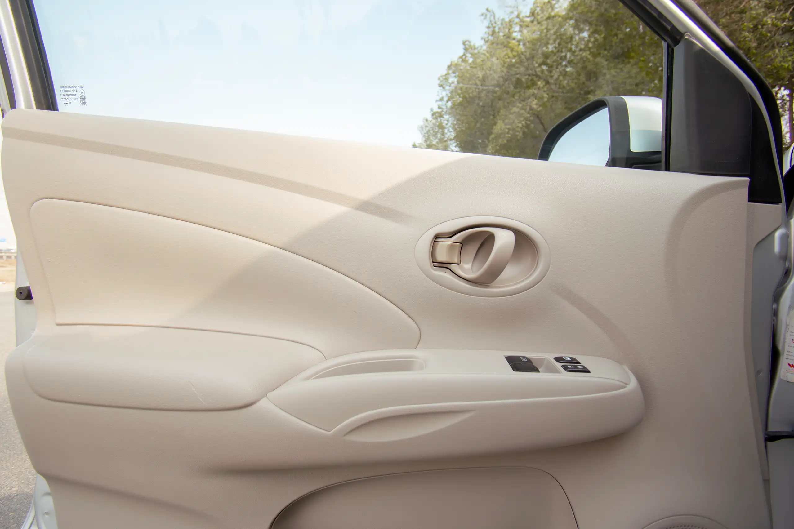 Used 2023 Nissan Sunny SV Silver – Driver Door Panel Full View at First Choice Cars Sharjah