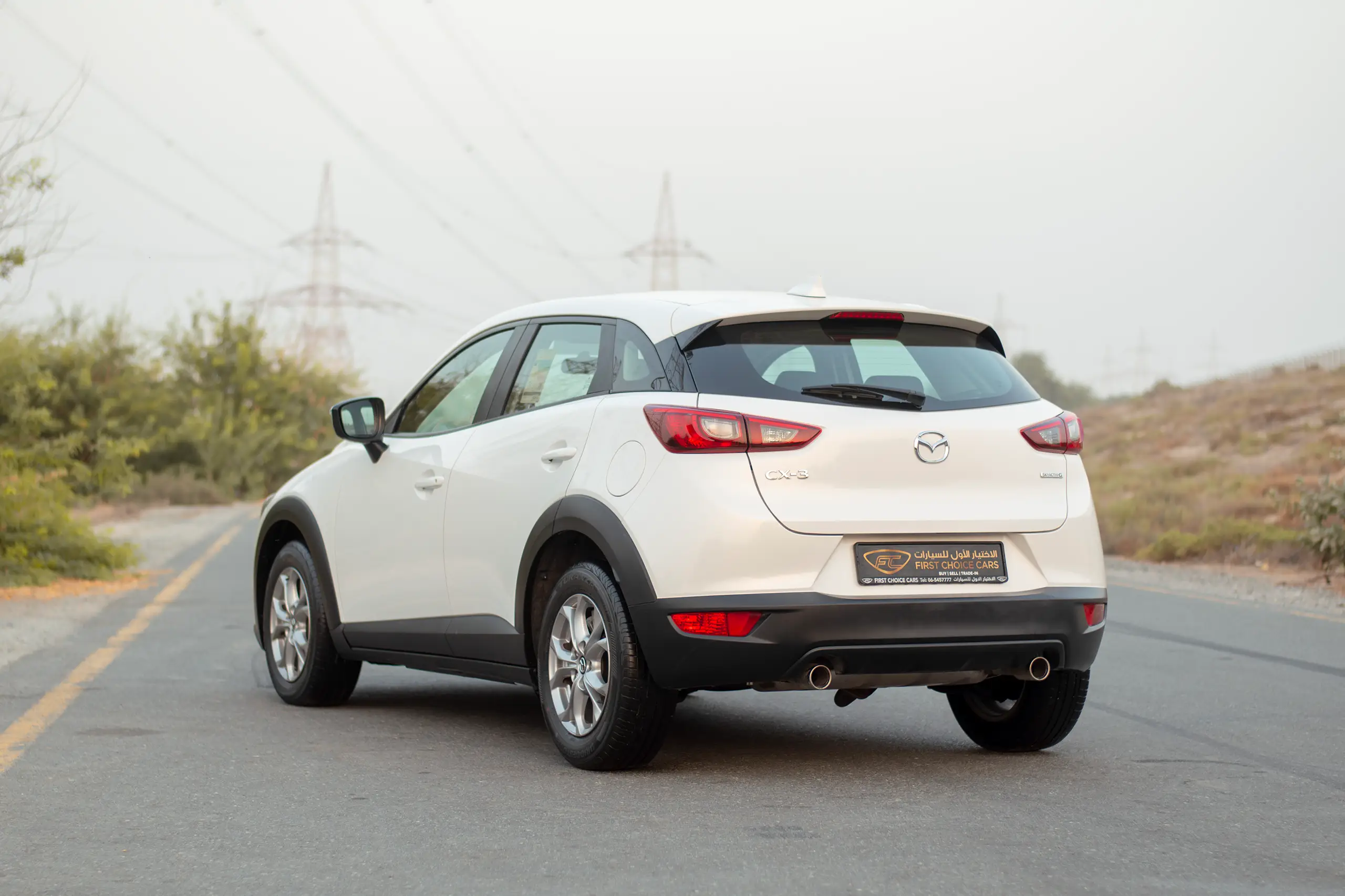 Used 2023 Mazda CX-3 Gs White – Left Back Diagonal (45°) View at First Choice Cars Sharjah