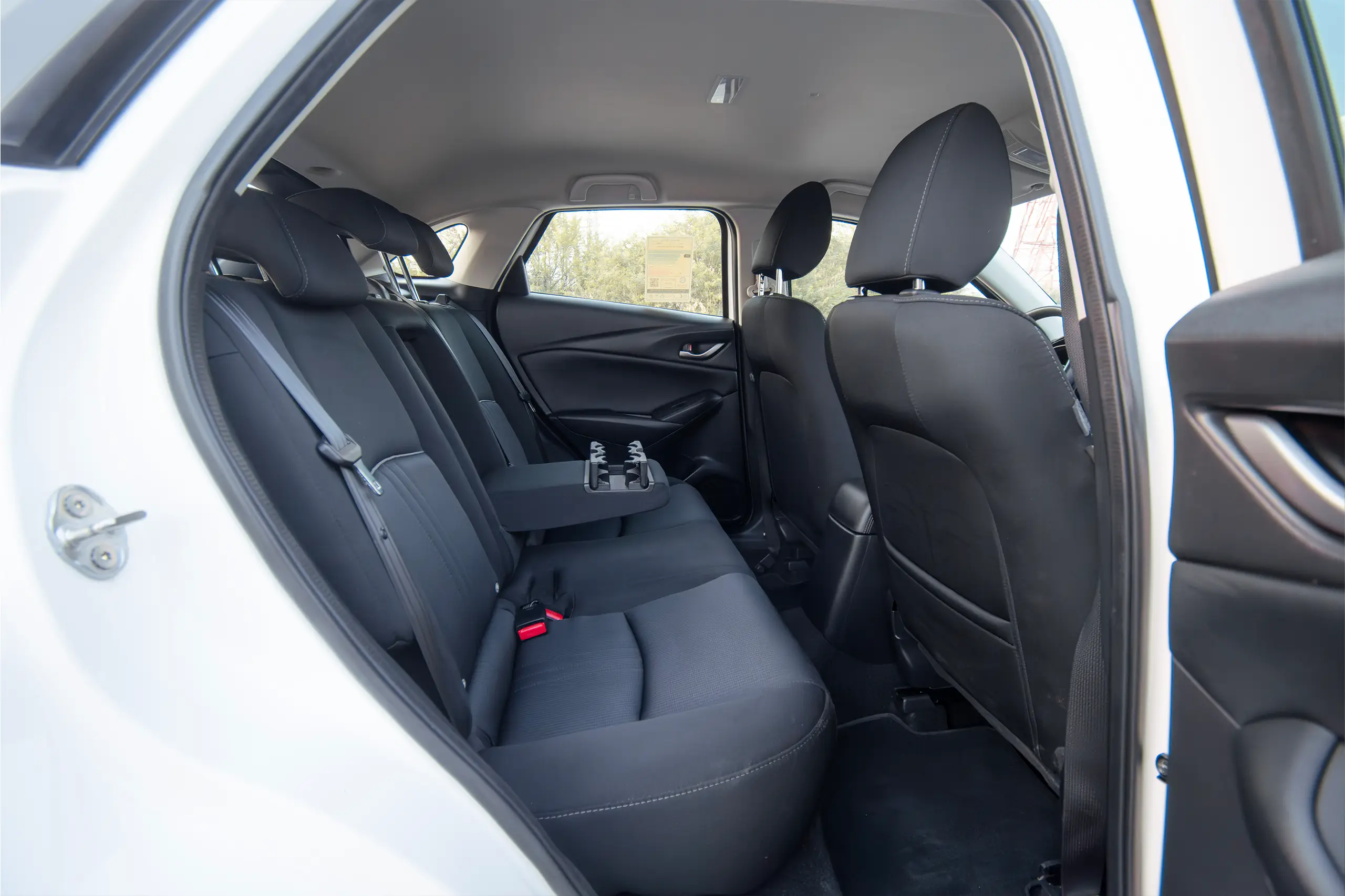 Used 2023 Mazda CX-3 Gs White – Rear Passenger Side Cabin View at First Choice Cars Sharjah