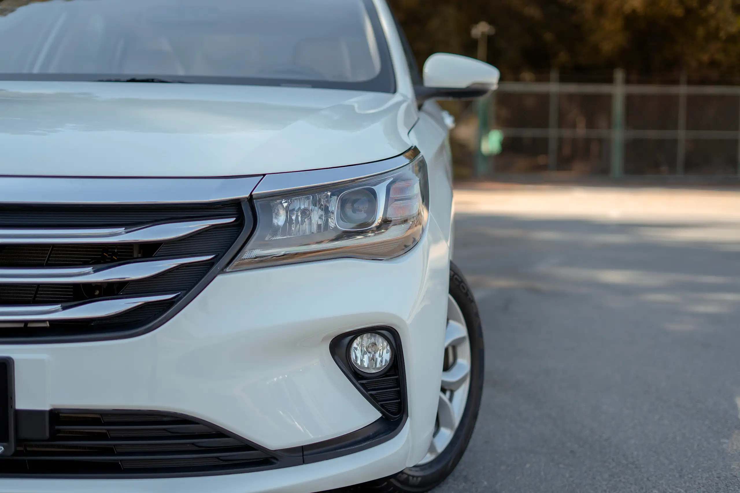 Used 2023 GAC GA4 GE White – Headlight Close-up at First Choice Cars Sharjah