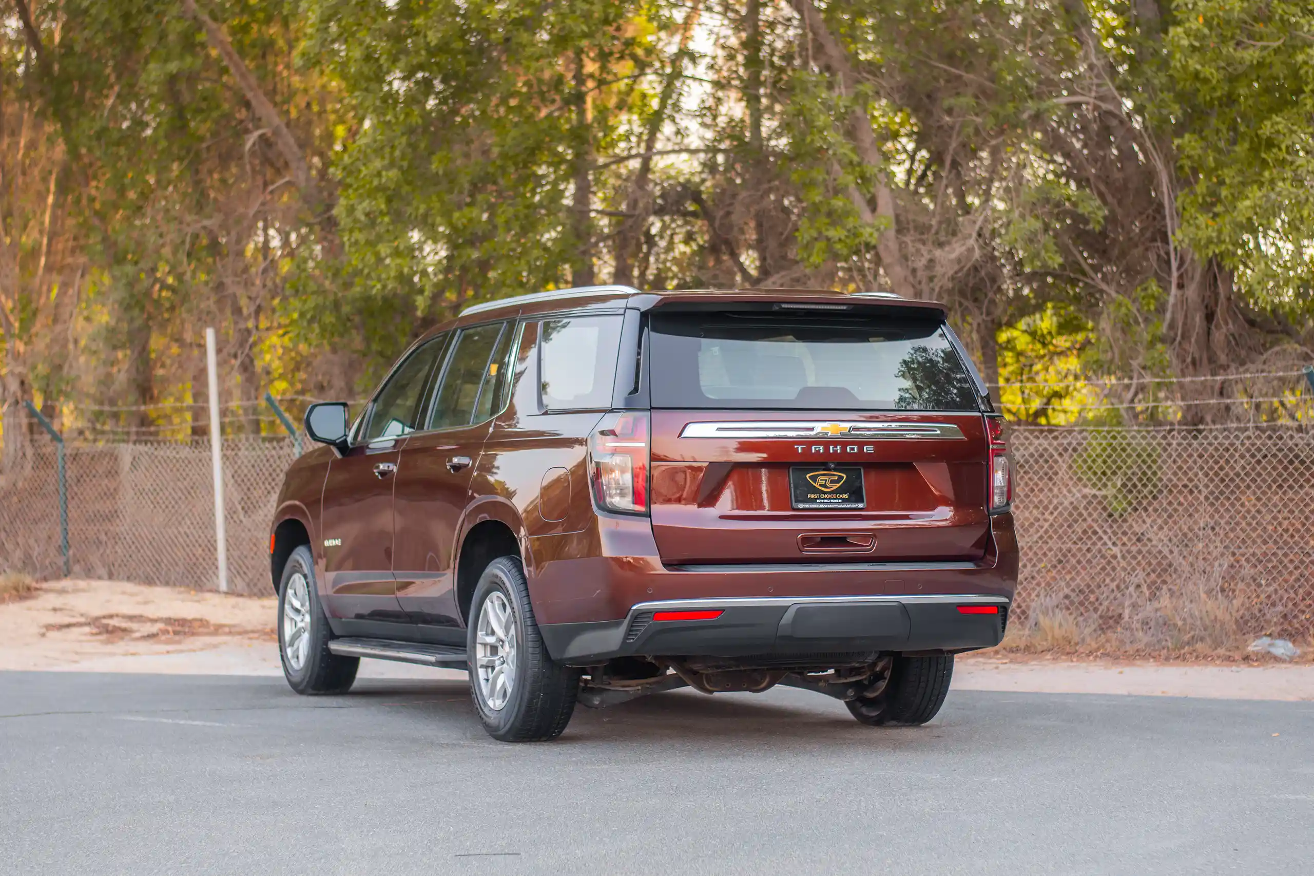 Used 2023 Chevrolet Tahoe LS Maroon – Left Back Diagonal (45°) View at First Choice Cars Sharjah