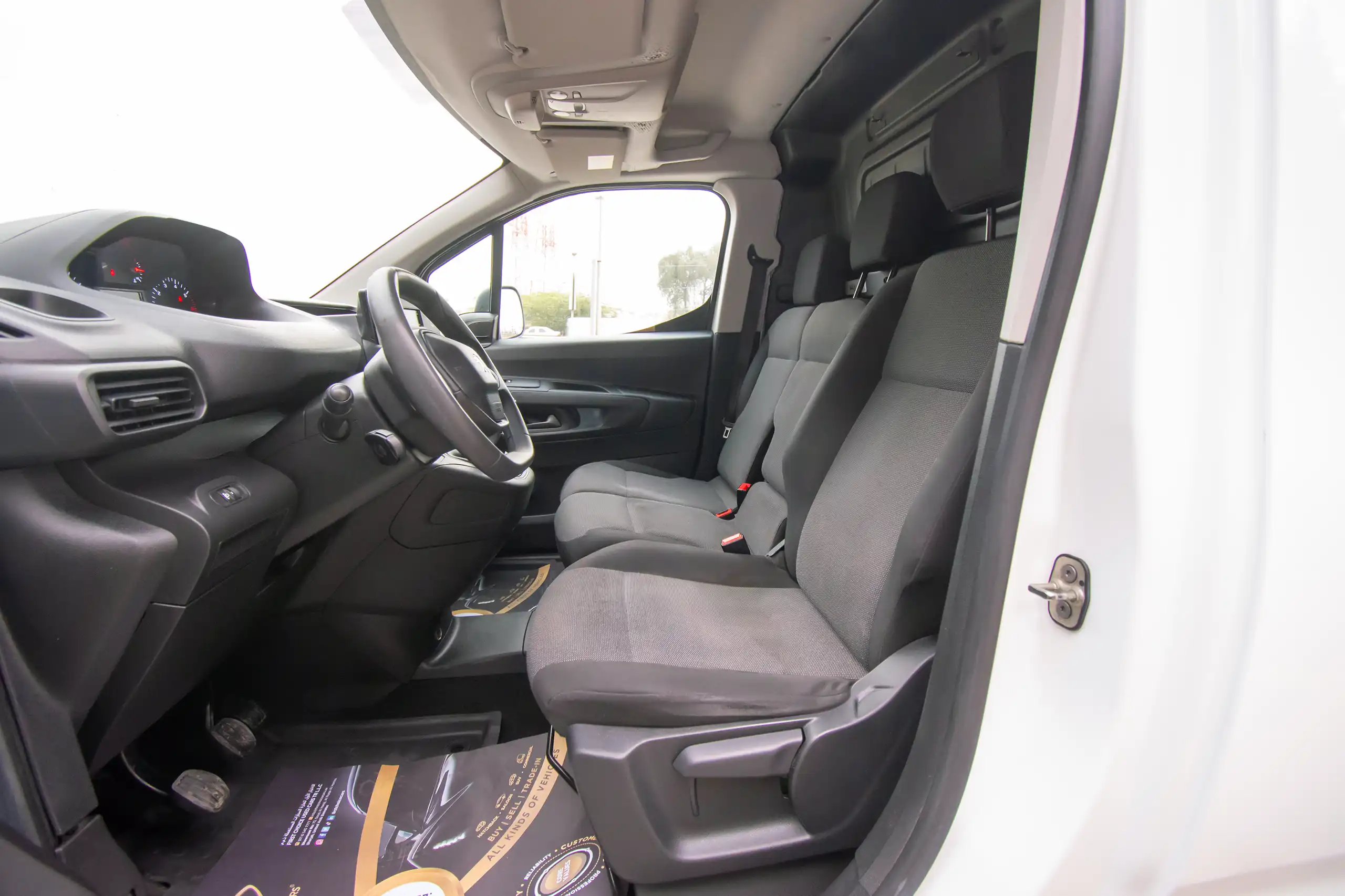 Used 2022 Peugeot Partner Standard White – Front Driver Side Cabin View at First Choice Cars Sharjah