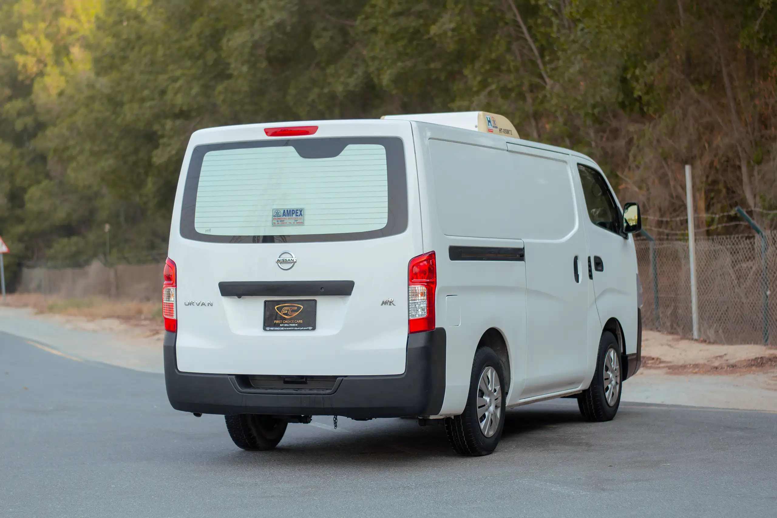 Used 2022 Nissan Urvan Standard Roof White – Right Back Diagonal (45°) View at First Choice Cars Sharjah