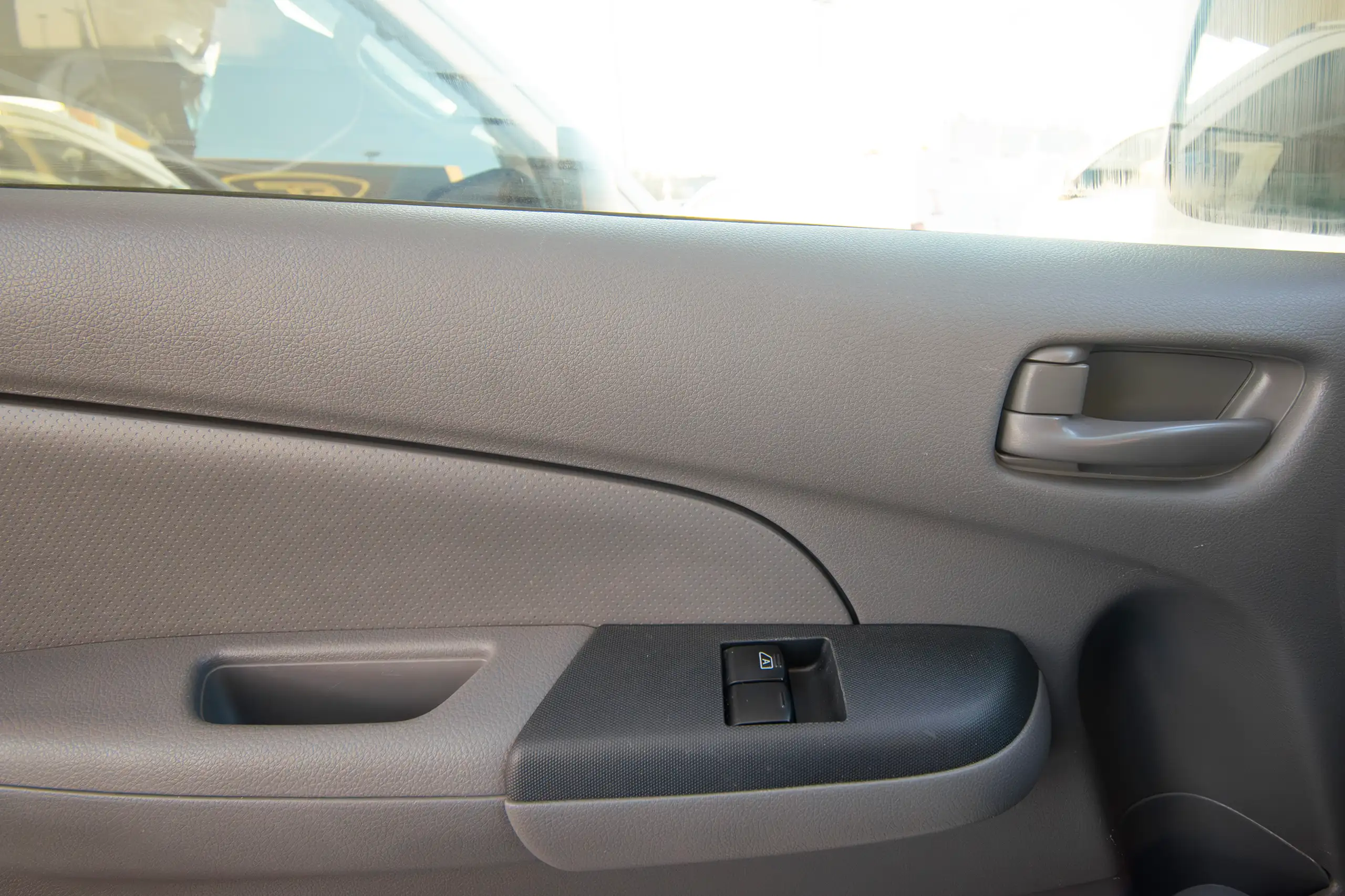 Used 2022 Nissan Urvan Standard Roof White – Driver Door Panel Full View at First Choice Cars Sharjah