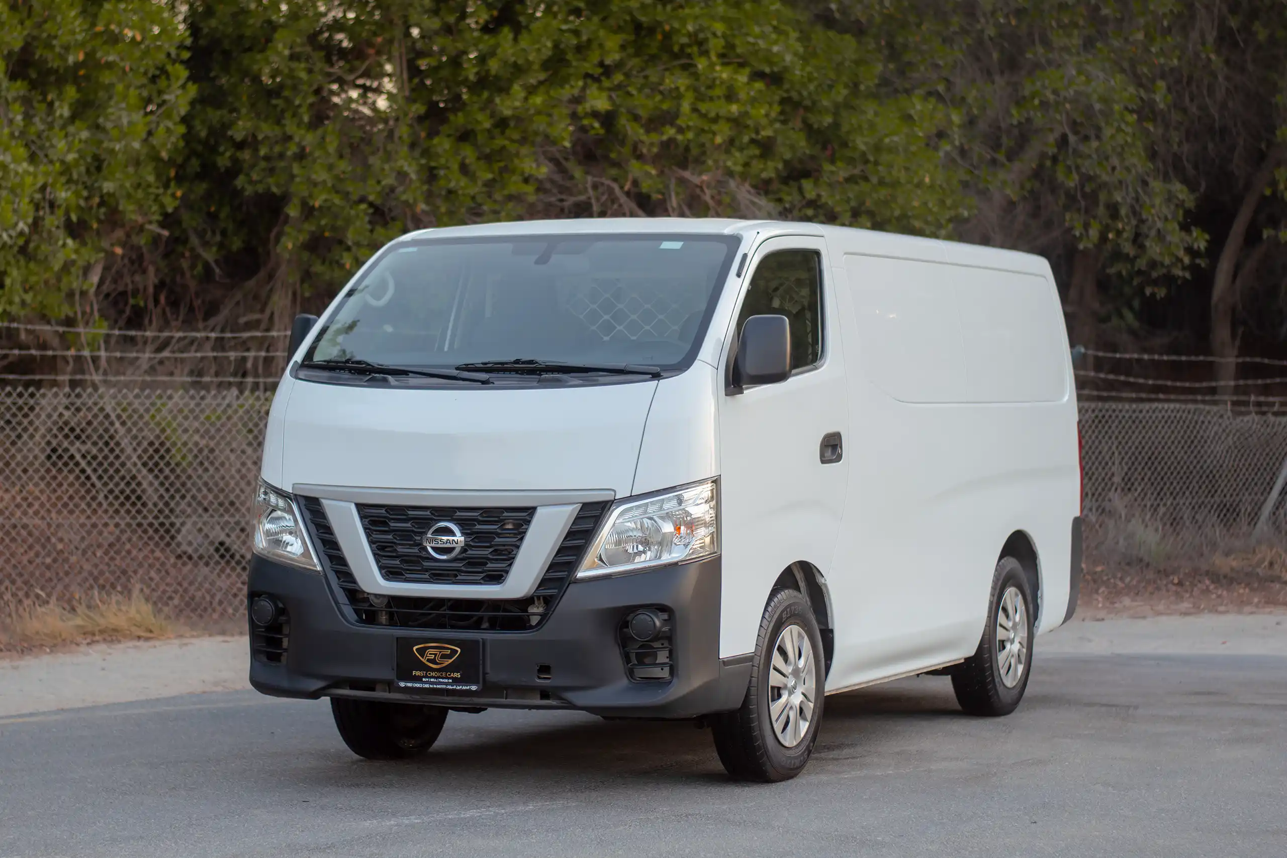 Used 2022 Nissan Urvan Standard Roof White – Left Front Diagonal (45°) View at First Choice Cars Sharjah