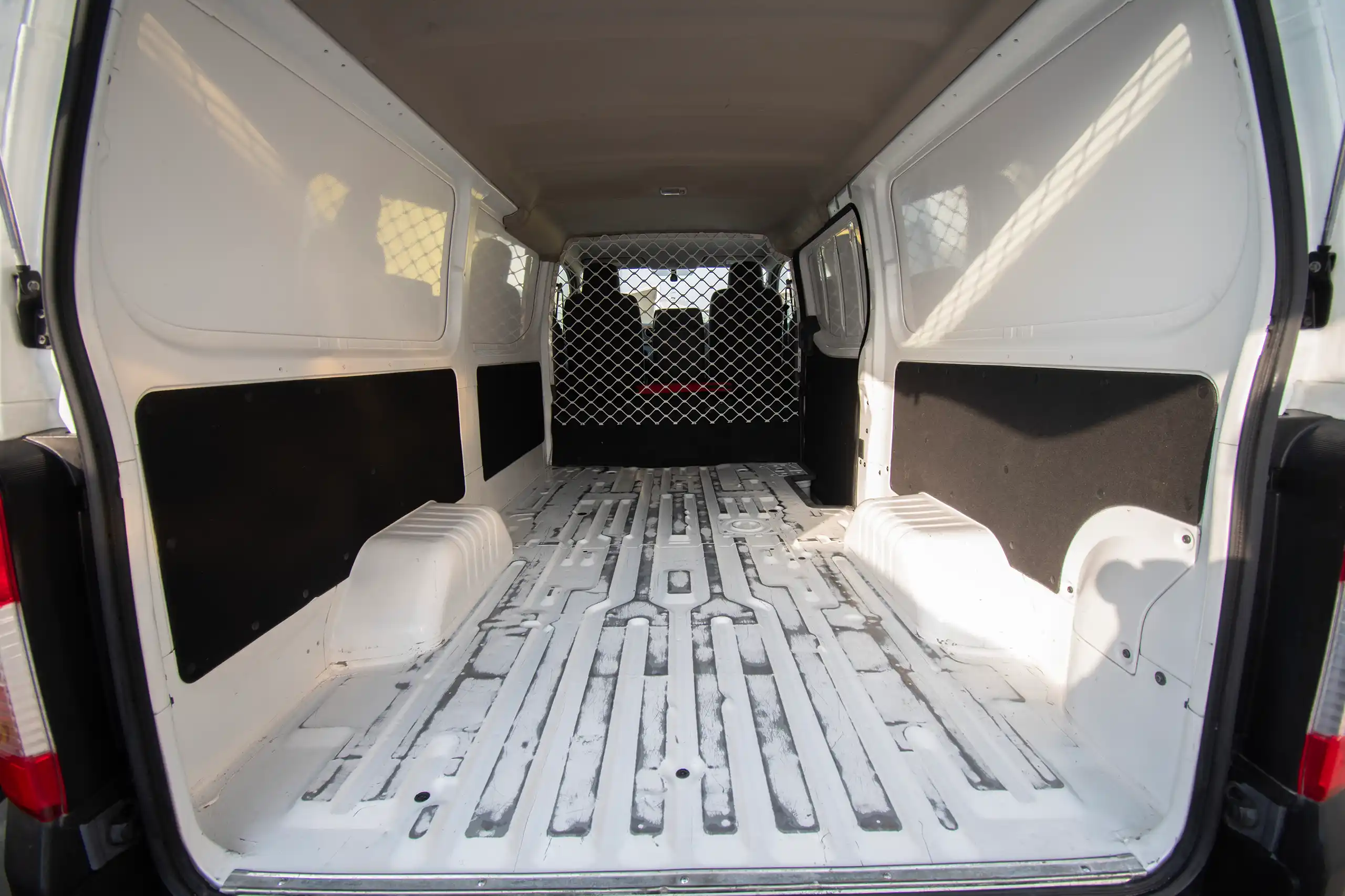 Used 2022 Nissan Urvan Standard Roof White – Delivery Box Rear Opening View at First Choice Cars Sharjah