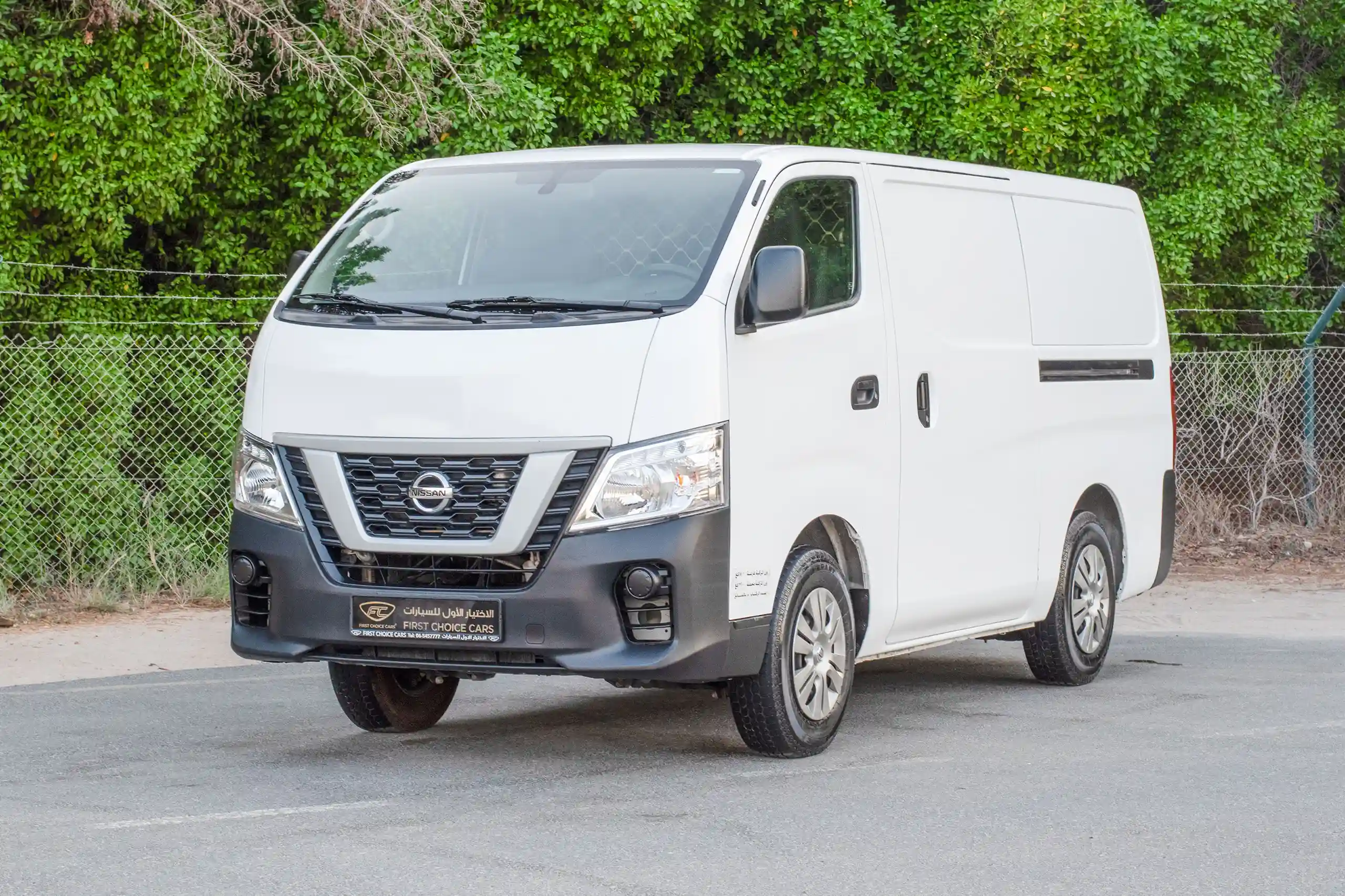 Used 2022 Nissan Urvan Standard Roof White – Left Front Diagonal (45°) View at First Choice Cars Sharjah