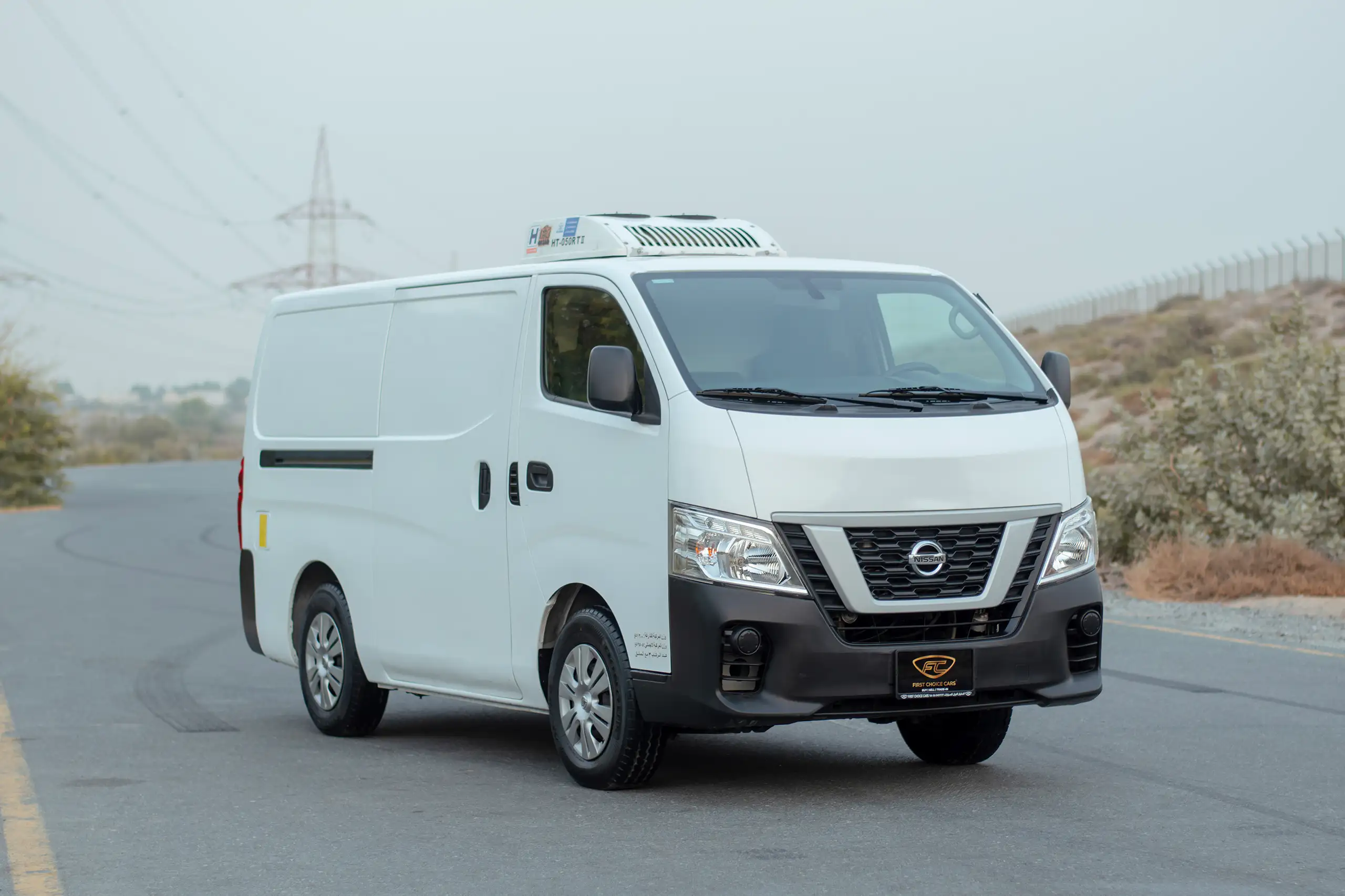 Used 2022 Nissan Urvan Standard Roof White – Right Front Diagonal (45°) View at First Choice Cars Sharjah
