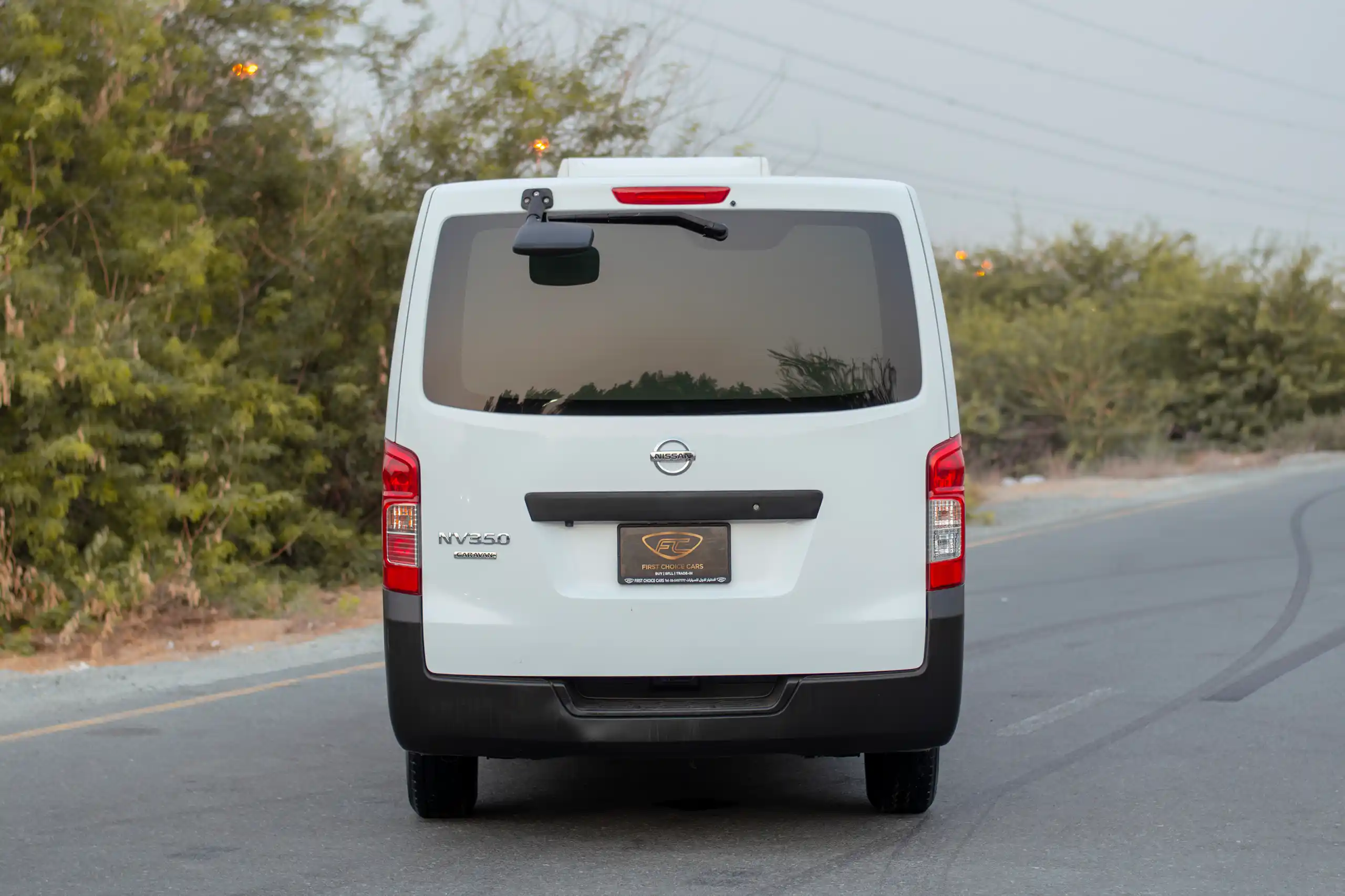 Used 2022 Nissan Urvan Standard Roof White – Back/Rear View at First Choice Cars Sharjah