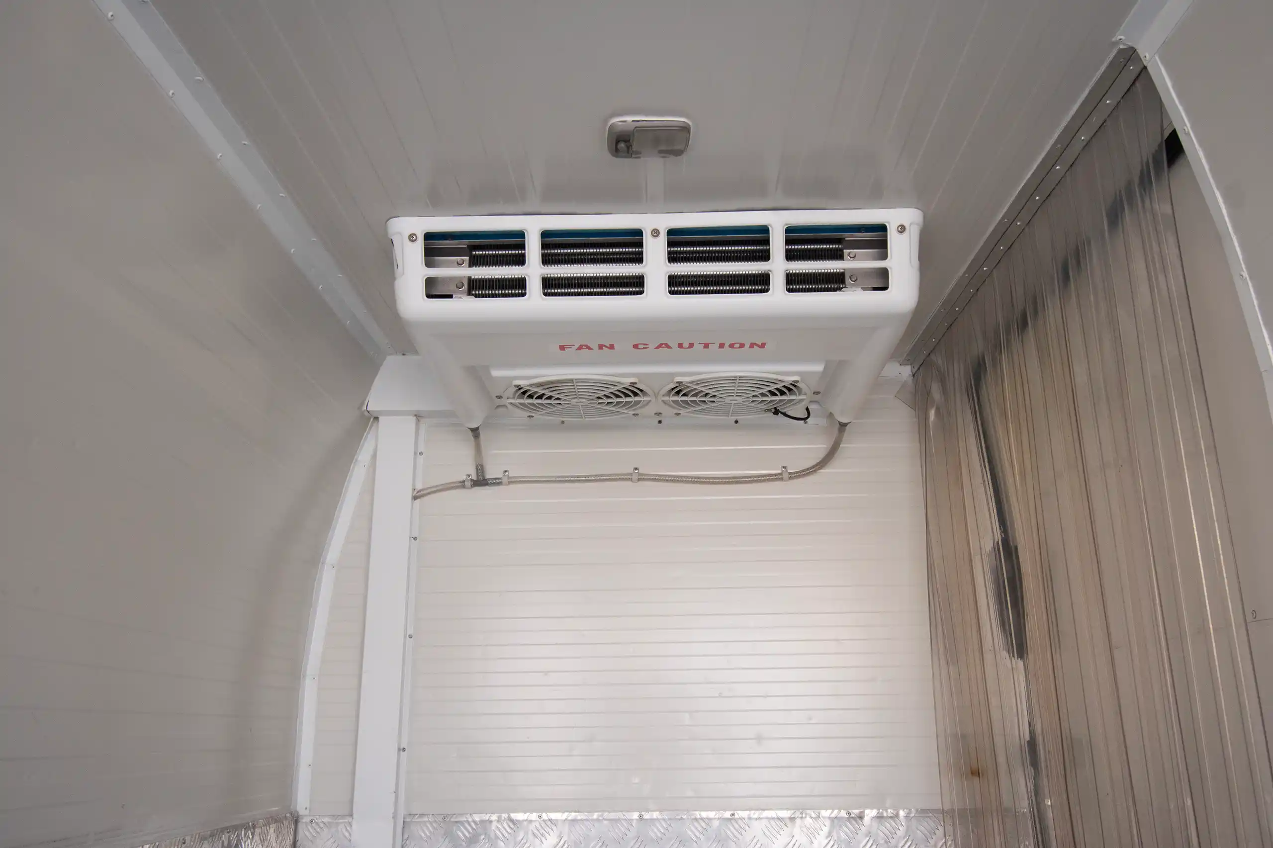 Used 2022 Nissan Urvan Standard Roof White – Chiller Cooling Unit View at First Choice Cars Sharjah