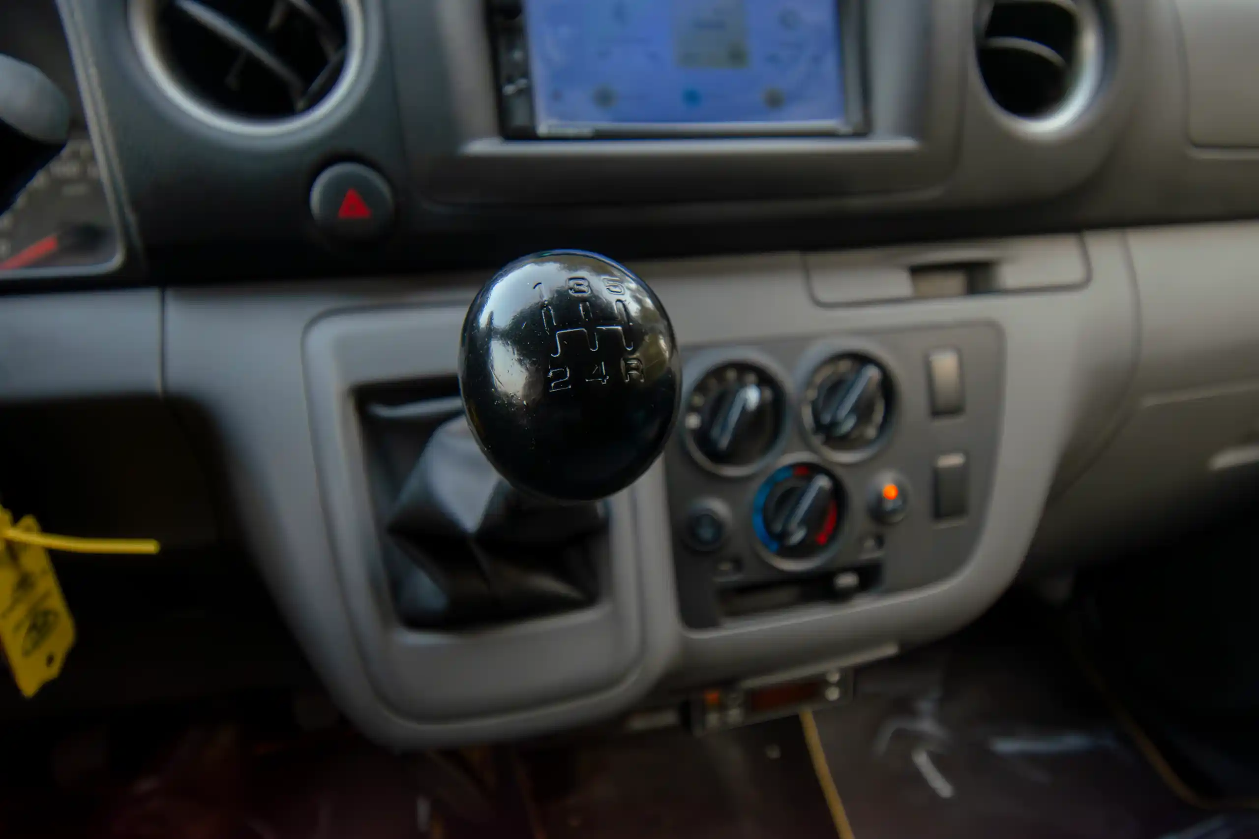 Used 2022 Nissan Urvan Standard Roof White – Center Console & Gear Shifter at First Choice Cars Sharjah