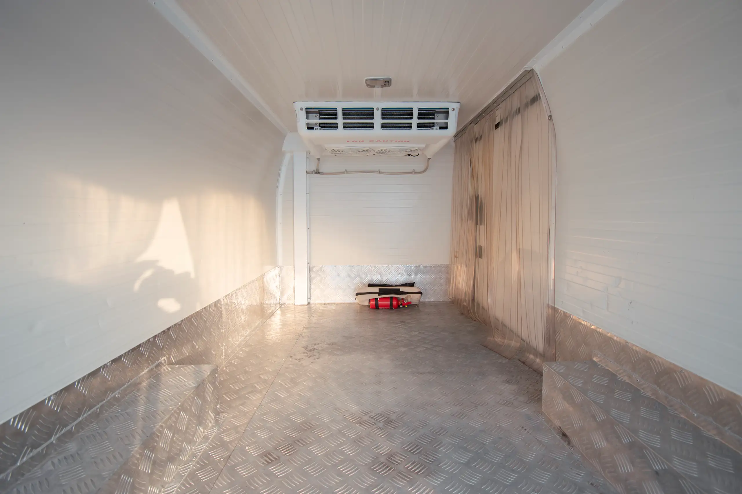 Used 2022 Nissan Urvan Standard Roof White – Chiller Box Rear Opening View at First Choice Cars Sharjah