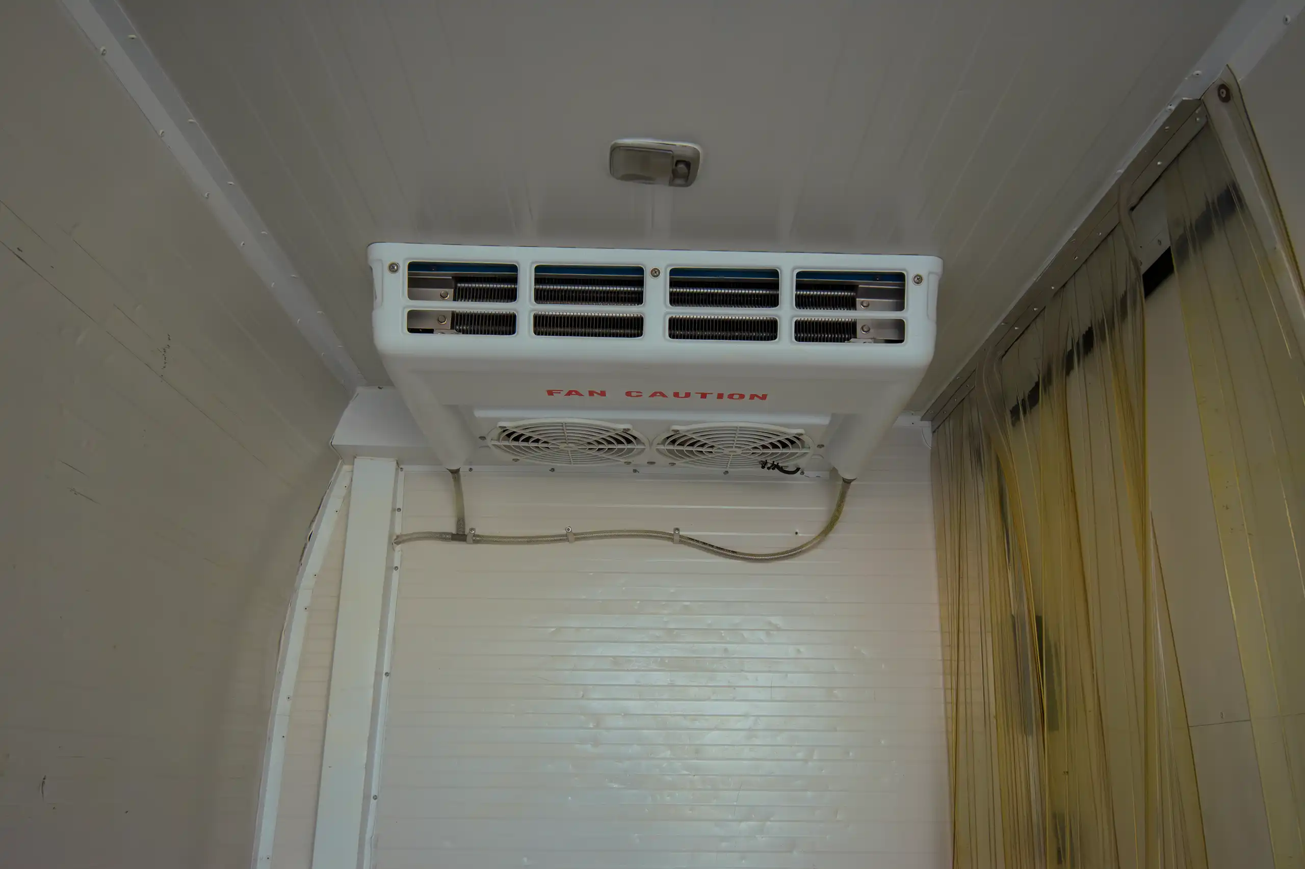 Used 2022 Nissan Urvan Standard Roof White – Chiller Cooling Unit View at First Choice Cars Sharjah