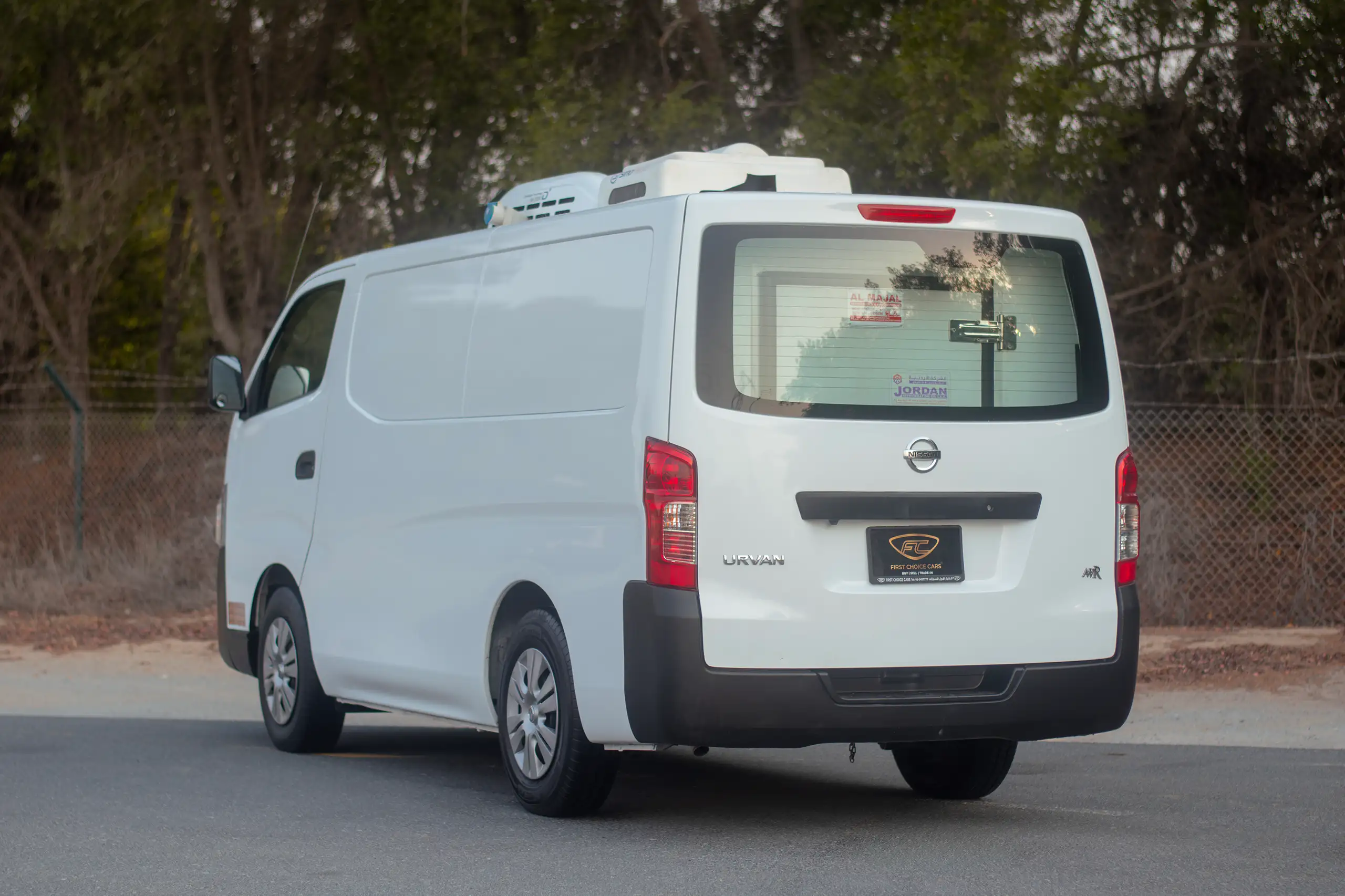 Used 2022 Nissan Urvan Standard Roof White – Left Back Diagonal (45°) View at First Choice Cars Sharjah