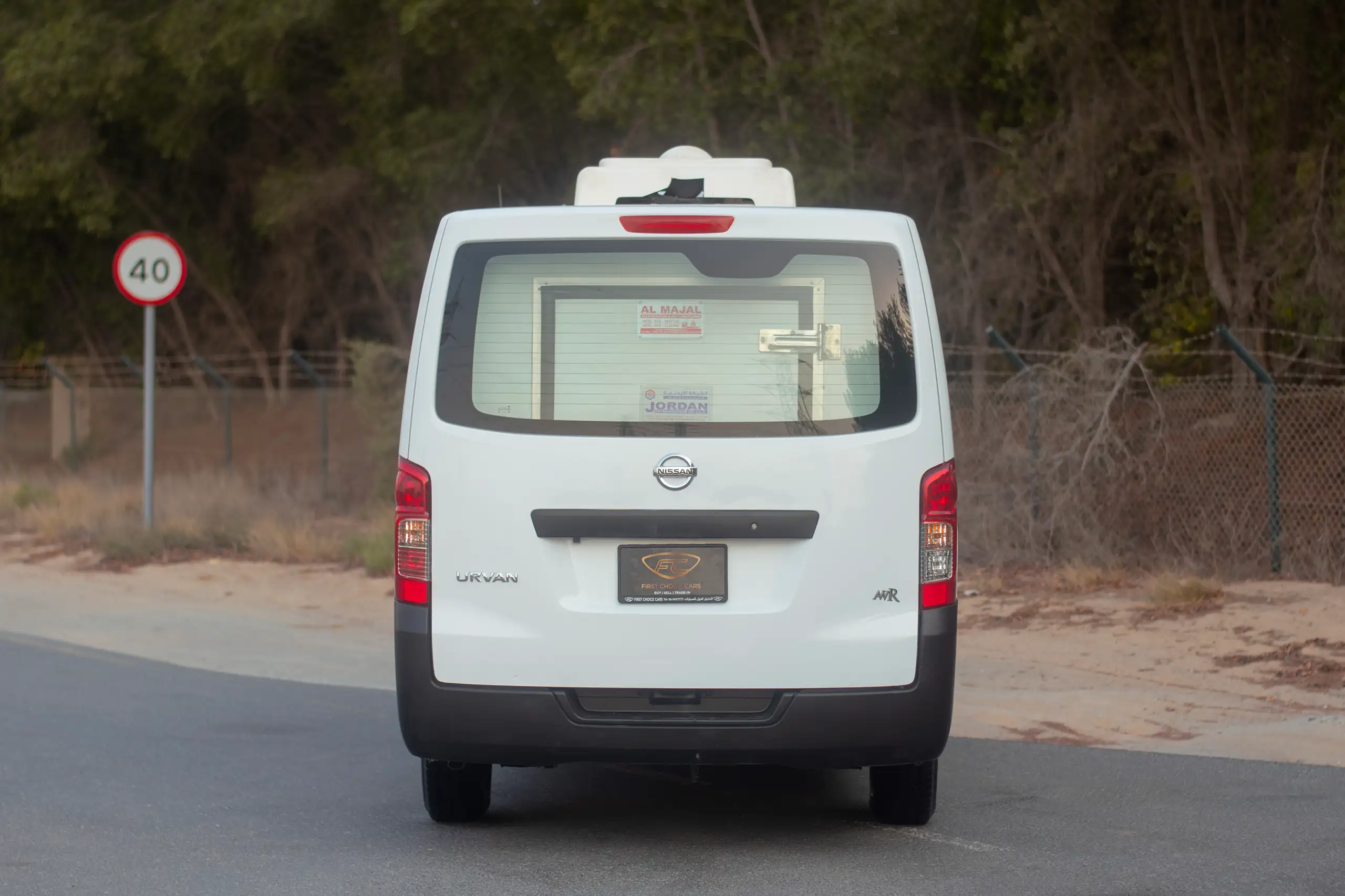 Used 2022 Nissan Urvan Standard Roof White – Back/Rear View at First Choice Cars Sharjah