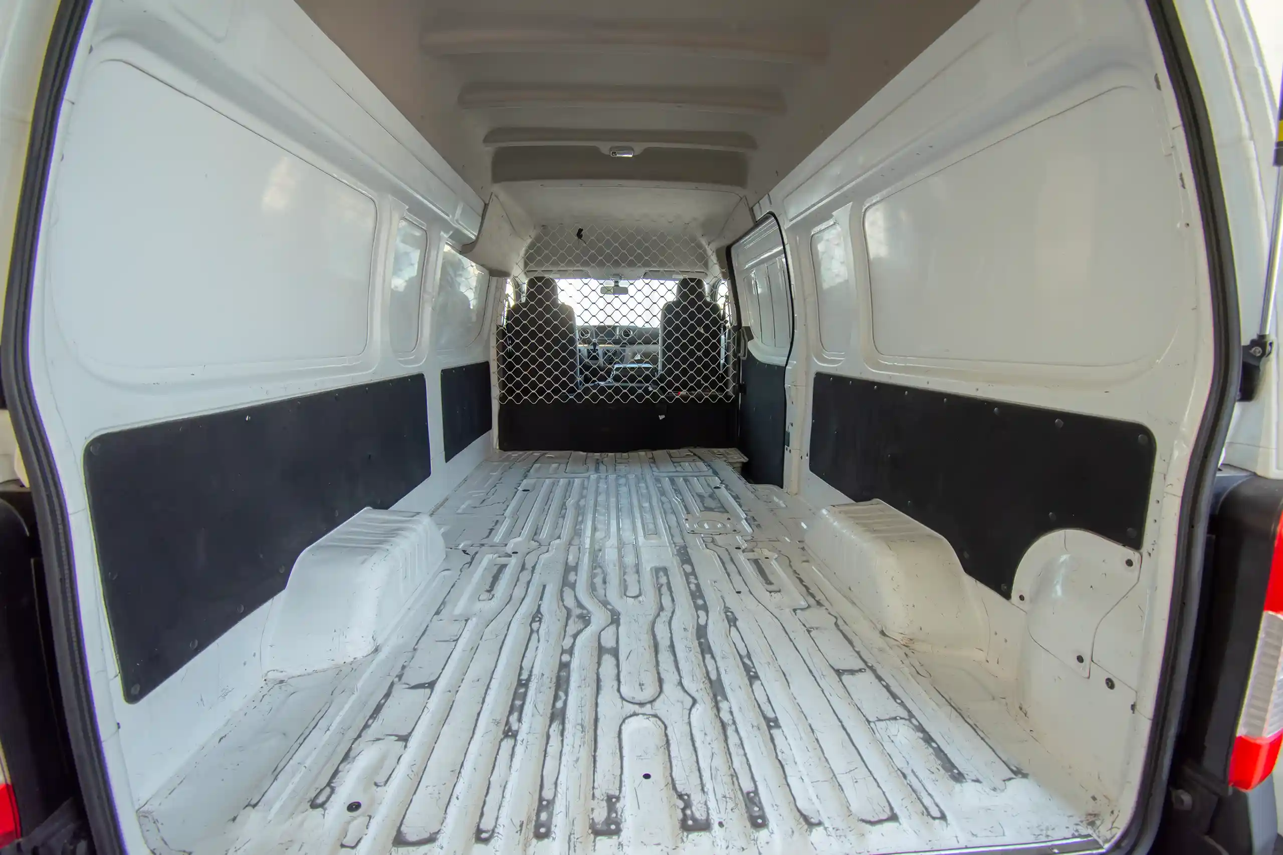 Used 2022 Nissan Urvan High Roof White – Delivery Box Rear Opening View at First Choice Cars Sharjah