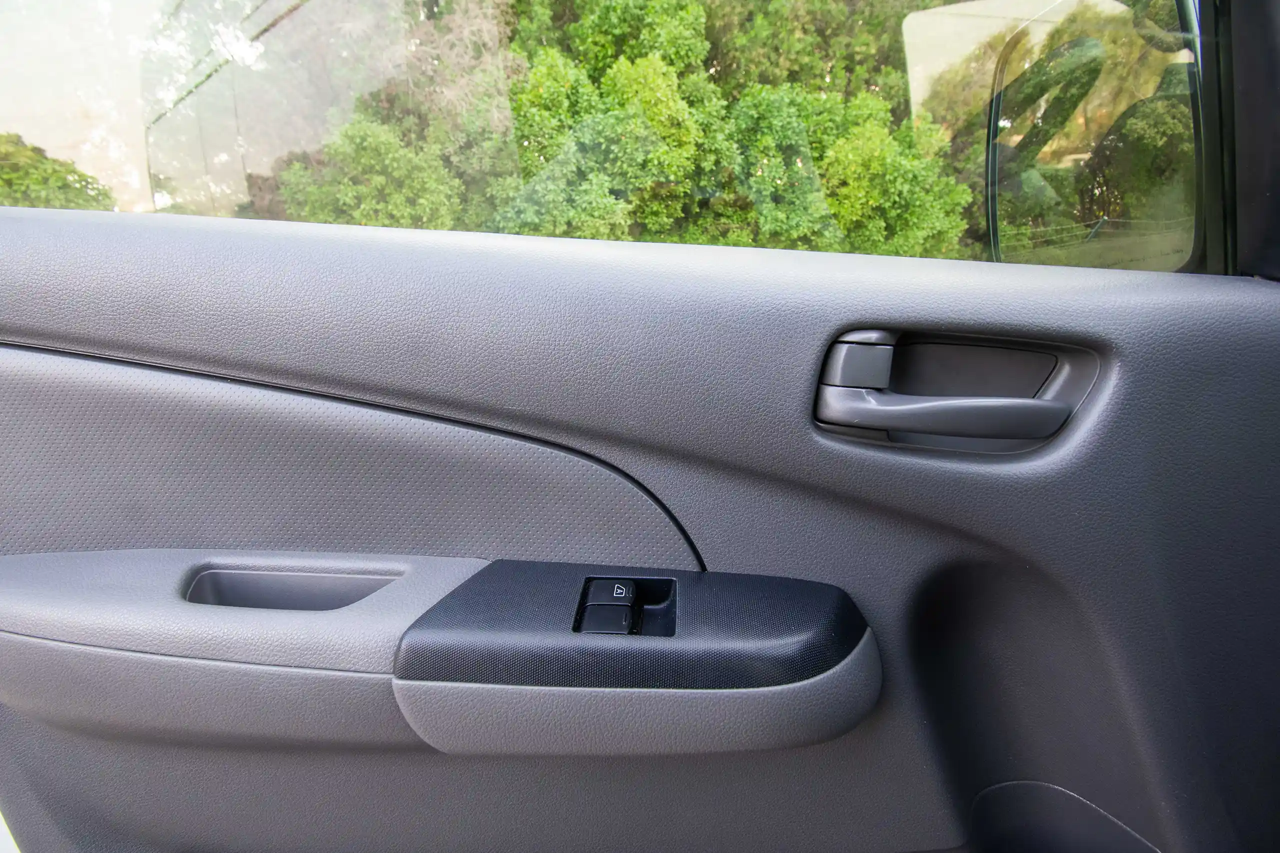 Used 2022 Nissan Urvan High Roof White – Driver Door Panel Full View at First Choice Cars Sharjah